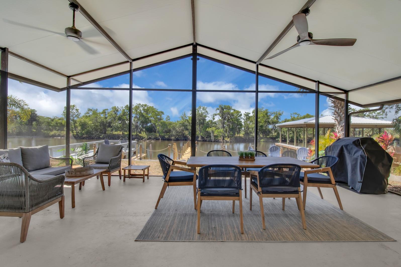 Welcome to your dream home in the sought-after waterfront community on Lemon Bluff Road! Introducing 1155 Lemon Bluff Road, a beautiful waterfront residence of 50' of seawall on the St. Johns River featuring 3 bedrooms, 2 bathrooms, dock space to park multiple boats, and an oversized PRIVATE SCREENED PATIO perfect for enjoying the best of Florida living. Step inside to an open floor plan which has been completely reimagined in 2023 with luxury finishes and designer detail throughout, creating a warm yet elegant feel. 

The stunning chef’s kitchen serves as the centerpiece of the home, showcasing an OVERSIZED quartz island with seating for 6, custom 42" shaker cabinetry, brushed gold hardware, stainless steel appliances, and a stylish herringbone backsplash. The open-concept layout flows seamlessly into the dining and living areas, making it an inviting place to cook, gather, and start the day, all accented by wide-plank flooring and abundant natural light.

The spacious primary suite offers a spa-inspired retreat-like bathroom with dual vanities, an oversized walk-in shower featuring a rainfall shower head, and a private toilet with bidet. The secondary bath continues the elevated aesthetic with slate tile and a calming, spa-like ambiance.

NO FRONT OR REAR NEIGHBORS offers added privacy on your private dock and pier with beautiful solar lightning, plenty of space to relax or jump on your boat and have direct access to the St. Johns River for boating, bass fishing, and waterfront recreation. A fire pit area adds to the outdoor lifestyle appeal.

Additional highlights include all new central A/C, a whole-home water softener system, and the confidence of a complete 2023 renovation — delivering both style and peace of mind.

Turn-key riverfront properties with this level of finish and design are VERY rare. Whether as a primary residence or weekend escape or an investment property, this residence offers modern luxury in a serene natural setting.

Experience the best of waterfront living at 1155 Lemon Bluff Road - where elegance, comfort, convenience, and the Florida lifestyle come together! Schedule your private showing today.