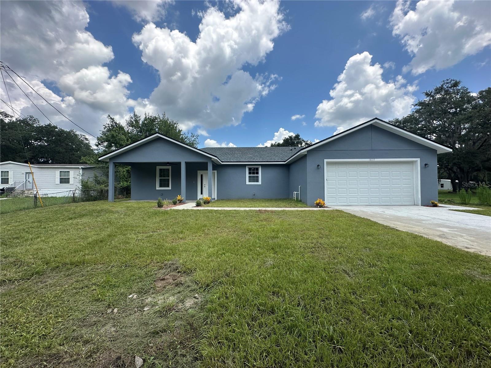 Welcome to this newly built 3-bedroom, 2-bathroom home located in the peaceful Bithlo / Orlando area, ZIP code 32820. Situated at the end of a quiet cul-de-sac, this home offers added privacy and a spacious backyard that extends into a beautiful natural setting filled with mature trees and serene wooded views. Designed for comfortable living, this home features a functional layout with modern finishes, a spacious living area, and a convenient 2-car garage. Enjoy the best of both worlds — the comfort and style of a brand-new home with the peaceful feeling of being surrounded by nature. The expansive backyard provides plenty of room to relax, entertain, or simply enjoy the tranquility of your surroundings. If you’re looking for a home that feels like a private retreat while still being close to Orlando amenities, this property offers the perfect balance of space, privacy, and natural beauty.