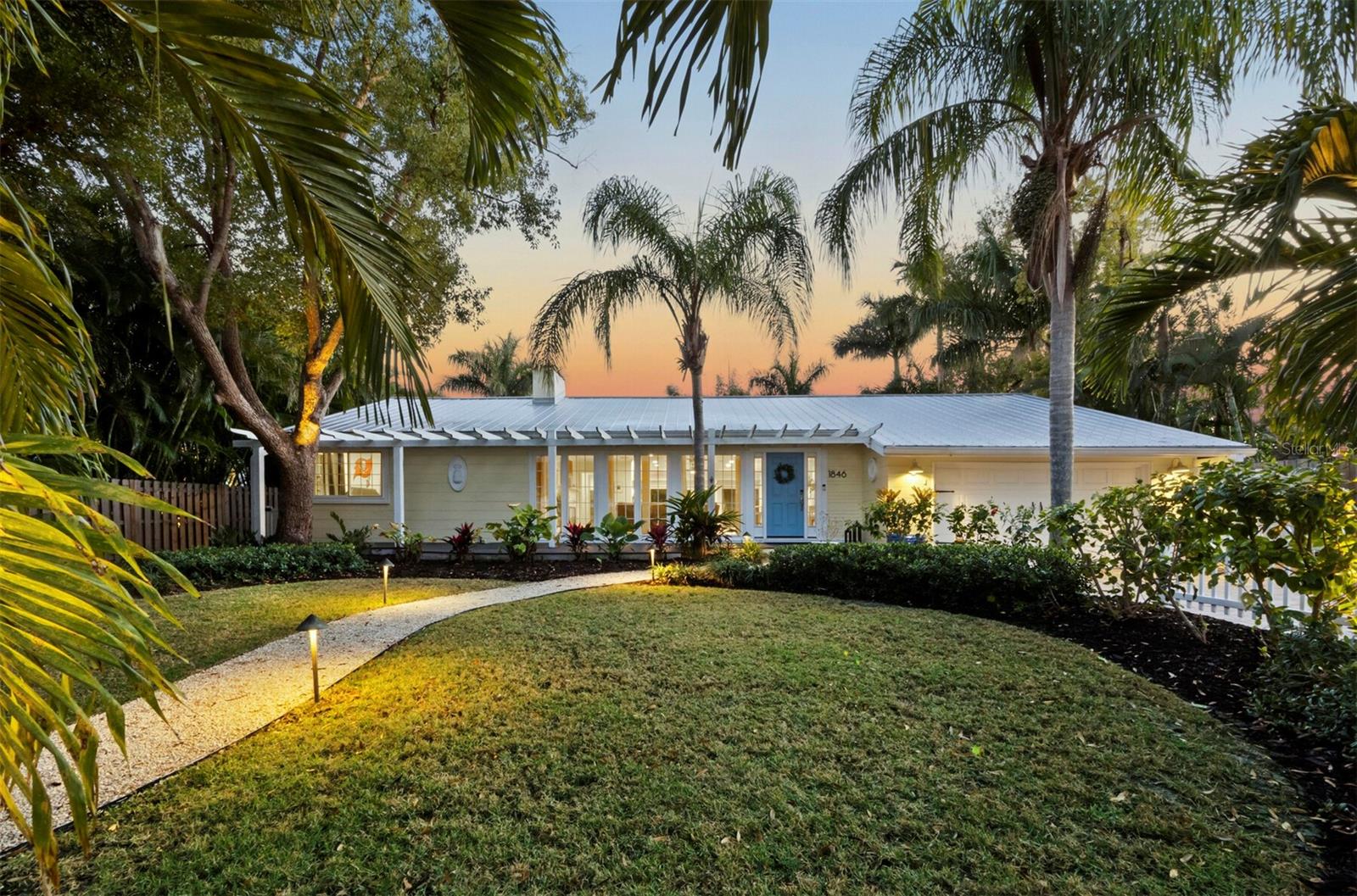 Located in the highly sought-after Avondale neighborhood, this beautiful home has been extensively and tastefully UPDATED while maintaining its timeless charm. The SPLIT FLOOR PLAN includes three oversized ENSUITE BEDROOMS, an additional powder room, and a separate study/den conveniently positioned adjacent to the primary suite. FLOOR -TO-CEILING WINDOWS and an open floor plan allow for abundant natural light and views of the HEATED SALT WATER POOL, travertine deck, and generously sized backyard. Significant renovations in 2022 and 2023 include a new primary suite addition, an EXTENSIVE KITCHEN REMODEL WITH UPDATED PLUMBING AND ELECTRICAL and new flooring throughout. Exterior improvements are equally impressive, featuring IMPACT RATED WINDOWS AND DOORS throughout, enhanced landscaping with drainage systems, irrigation, front yard fencing, and updated lighting. Additional features include a 2-car garage with EPOXY FLOORING, METAL ROOF(2007/2021), and NEWER A/C (2021). The elevation of the house is above the based flood elevation and experienced no flood on the property during the 2024 storm season. Perfectly situated between Southside Village and the vibrant Downtown Sarasota Bayfront, the property is also located within the highly sought-after Southside Elementary School District, making it a premier choice for those seeking convenience, style, and location.