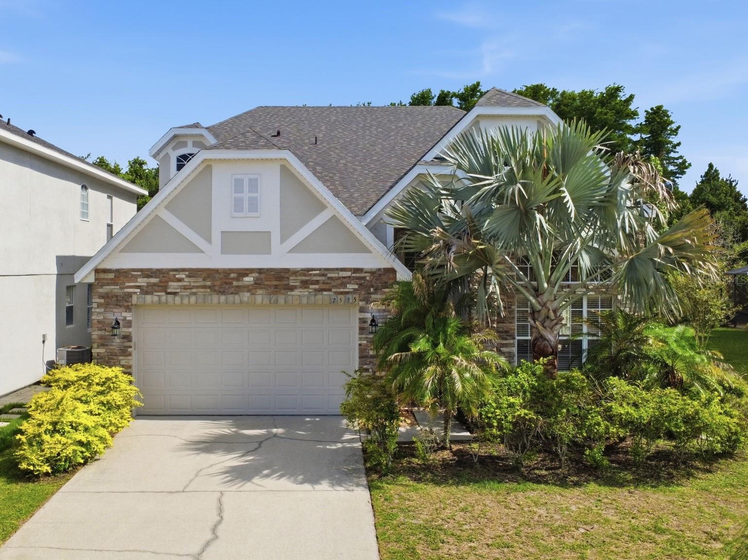 NEW ROOF (JUNE 2026) | TWO PRIMARY SUITES | HEATED POOL & SPA | NO REAR NEIGHBORS | GATED COMMUNITY

Welcome to this fully upgraded 5-bedroom, 3.5-bath pool home offering exceptional flexibility, luxury, and peace of mind. Major system upgrades include dual HVAC systems (2022) featuring a Trane XR14 heat pump and a Carrier heat pump with Wi-Fi connectivity for efficient year-round comfort.

Inside, you’ll find new hardwood flooring throughout (no carpet), a new staircase, upgraded moldings, fresh interior paint, custom wood shutters, and updated lighting and ceiling fans. The kitchen is designed for everyday living and entertaining, featuring brand-new stainless-steel appliances and 42-inch custom cabinetry.

Designed for both comfort and flexibility, this spacious home offers two primary suites with ensuite baths, including a sought-after first-floor suite overlooking the pool. Soaring 24-foot ceilings, expansive custom windows, and dual living areas create a bright, grand atmosphere, while the upstairs flex space is ideal for a theater, game room, office, or additional lounge.

Enjoy the best of Florida living in your private outdoor oasis, complete with a heated pool and spa, refreshed finishes, new lighting, a resurfaced deck, and a new screen enclosure, perfect for year-round relaxation and entertaining. Beyond the pool, you’ll find approximately 20 additional feet of backyard space behind the existing landscaping, offering endless possibilities to expand your outdoor living area, create a garden, install a fence, or design your own private retreat. Fresh exterior paint and professionally sealed brick pavers complete the home’s impressive curb appeal.

Nestled in the gated Sandhill Preserve community, this home enjoys serene preserve views with no rear neighbors, rare privacy, and a neighborhood playground. Ideally located in Southeast Orlando, you’re just minutes from Lake Nona, Medical City, Orlando International Airport, major highways, shopping, dining, and continued growth.

Additional upgrades include a new garage door opener system, electronic keypad entry with fingerprint and guest access, an irrigation system, epoxy-coated garage flooring, and abundant storage with a large attic and under-stair storage space.

This truly move-in-ready home combines luxury finishes, modern systems, versatile living spaces, and an unbeatable Orlando location. Homes with this level of upgrades and functionality rarely come available, schedule your private showing today!