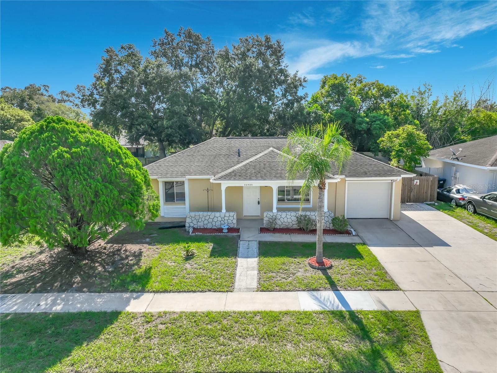 Clean, move-in ready 2-bedroom, 2-bath home in Orlando with no HOA. This wonderful property is ideal for a first-time homebuyer or investor alike. Freshly painted inside and out, the home features new interior and exterior paint, ceramic tile throughout, spacious living areas, a screened-in porch, a wide concrete driveway, and a large fenced backyard offering privacy and outdoor enjoyment. The garage floor has also been freshly painted. Major updates include a roof replaced in 2015 and an air conditioning system replaced in 2025.

Conveniently located near Lake Nona, Medical City, Orlando International Airport, SR-417, Florida’s Turnpike, SunRail access, shopping, dining, and major employment corridors. A short distance from Walt Disney World, this home offers comfort, convenience, and excellent accessibility in one of the few nearby neighborhoods with no homeowners association restrictions. Vacant and ready for immediate occupancy. Schedule your showing today.