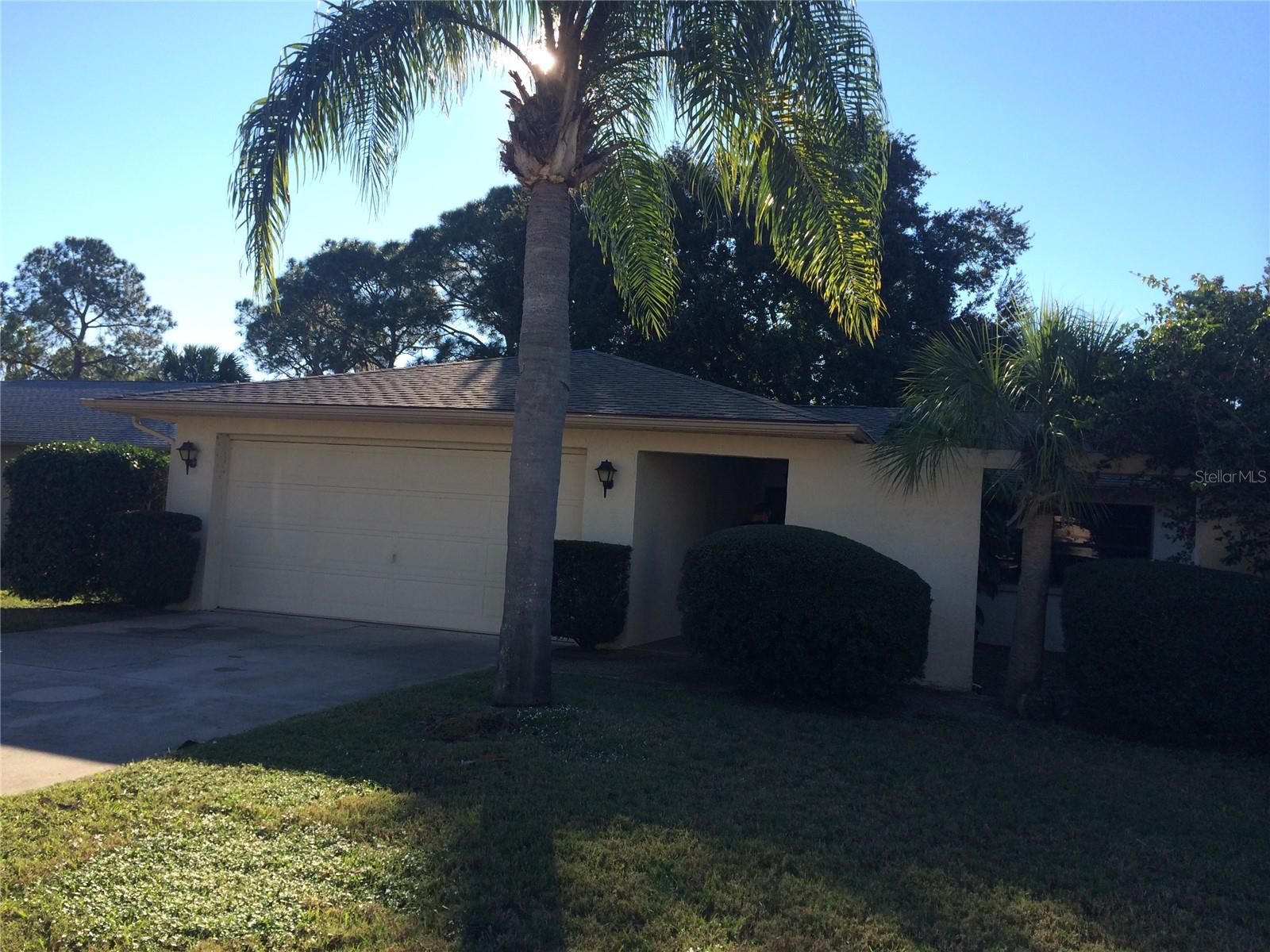 Beautifully done, 3 bedrooms, 2 baths, 2 car garage, Porcelain tile through out, Granite counter tops in Kitchen & baths, split plan, extra space plus dinette off kitchen, Screen enclosed porch, Great location.