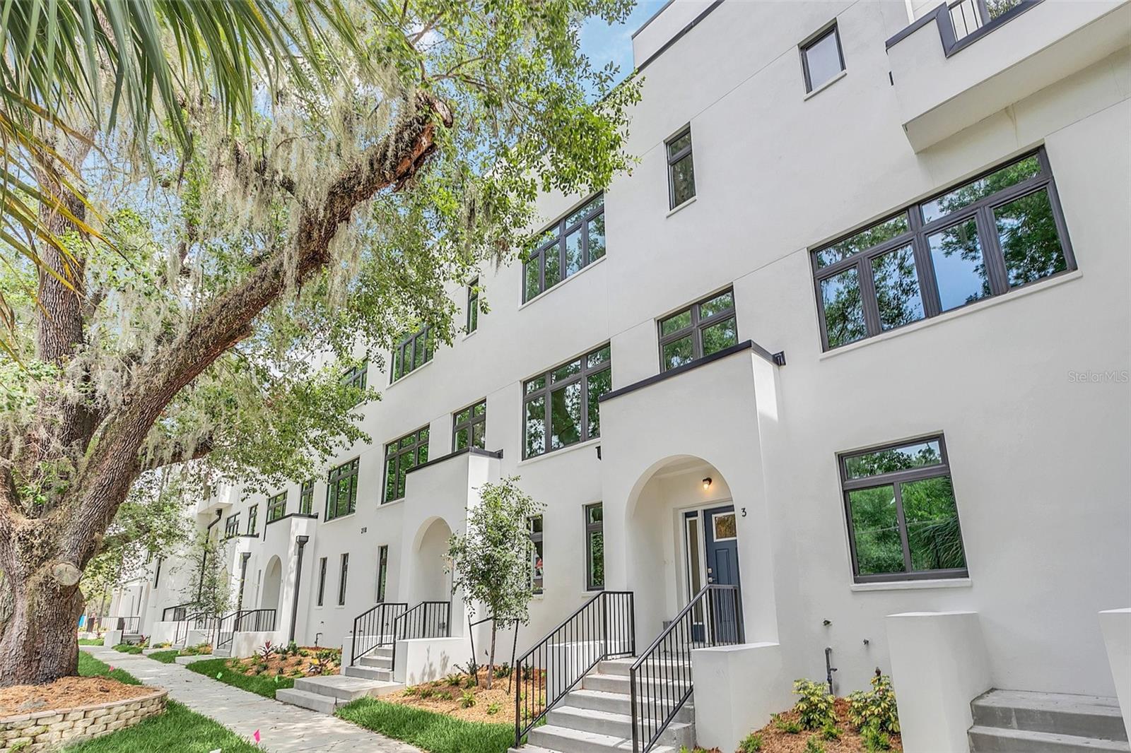 If you're searching for luxury living in the heart of Orlando, look no further than the townhome community of Highland at Park Lake. Nestled among the bustling streets of the city, Highland at Park Lake offers residents the perfect blend of upscale living and urban convenience. Upon entering the community, you'll be greeted by lush, landscaped grounds and the beautiful architecture of the townhomes. Each home features high-end finishes and modern design, with open floor plans and plenty of natural light. Step inside and you'll find top-of-the-line appliances in the gourmet kitchens, spacious living areas for entertaining, and large bedrooms with en-suite bathrooms. And with private rooftop terraces, you can enjoy the beautiful Florida weather all year round. But what really sets Highland at Park Lake apart is its prime location. Located just steps from the vibrant nightlife of downtown Orlando, you'll be within close proximity of the city's best restaurants, shops, and entertainment. And with easy access to major highways, getting around the city is a breeze. So why settle for ordinary when you can have luxury living at Highland at Park Lake? Various floor plans, views, and accessibility features available. Come see for yourself and schedule a tour today.