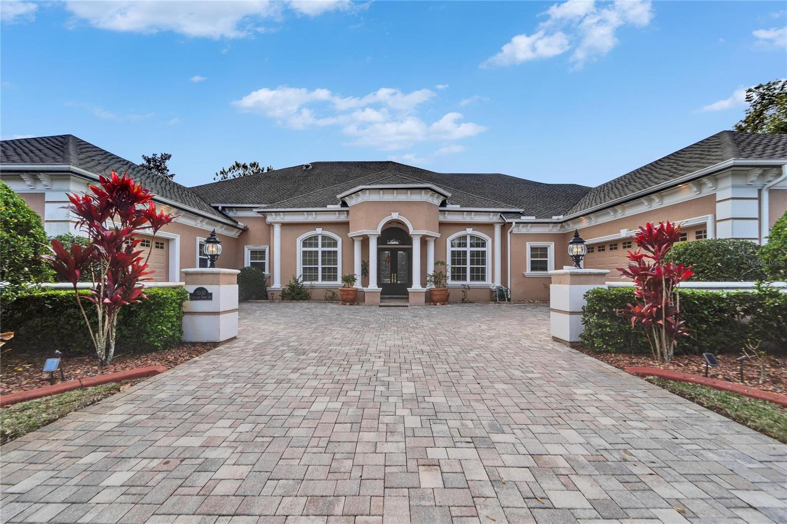 Luxury Custom Home in Exclusive Gated Community with Water View

Roof can be replaced prior to closing. A/C and water heater are newer.

Experience the best of luxury living in this exceptional custom-built home, privately situated on a quiet cul-de-sac in one of the area’s most desirable gated communities. Offering serene water views and unmatched quality, this residence is designed for buyers seeking a move-in-ready home without the need for renovations or repairs for years to come—offered below market value.

Built with superior craftsmanship and high-end materials, this home delivers an extraordinary lifestyle. Features include a comprehensive interior and exterior security system, intercom in every room, and integrated Bluetooth ceiling speakers, along with additional smart home features such as a spa control system.

The spacious layout includes an expansive kitchen, family room, and formal dining area. The chef’s kitchen is equipped with top-of-the-line appliances, including double Wolf convection ovens, a Wolf convection microwave, Thermador warming drawer, and Sub-Zero full refrigerator and freezer. A dry bar connects the kitchen and dining room and features a Monogram wine chiller and ice maker. The kitchen also boasts a custom backsplash, ceiling-height cabinetry, and a large walk-in pantry.

Fourteen-foot ceilings throughout the first floor create a grand, open feel, perfect for showcasing art collections. Premium finishes include cherry wood cabinetry (kitchen, office, and built-ins), maple interior shelving and doors, and 20” porcelain tile flooring, most set on the diagonal. Additional upgrades include motion-sensing interior lighting, Kohler toilets and undermount sinks, Ethan Allen cabinetry, granite countertops, solid wood doors, and custom solid wood closet systems throughout.

Outdoor living is equally impressive, featuring a screened-in covered porch with a full outdoor kitchen, pool, and stunning water views—ideal for entertaining or relaxing.

Located in Keystone Shores, a private community of just 35 homes, residents enjoy access to a scenic lake for fishing, as well as nearby park, playground, tennis, and basketball facilities.

Furniture package available for purchase separately.

Conveniently located with easy access to the Veterans Expressway, Downtown Tampa, and the Gulf beaches.

This is a rare opportunity—schedule your private showing today.