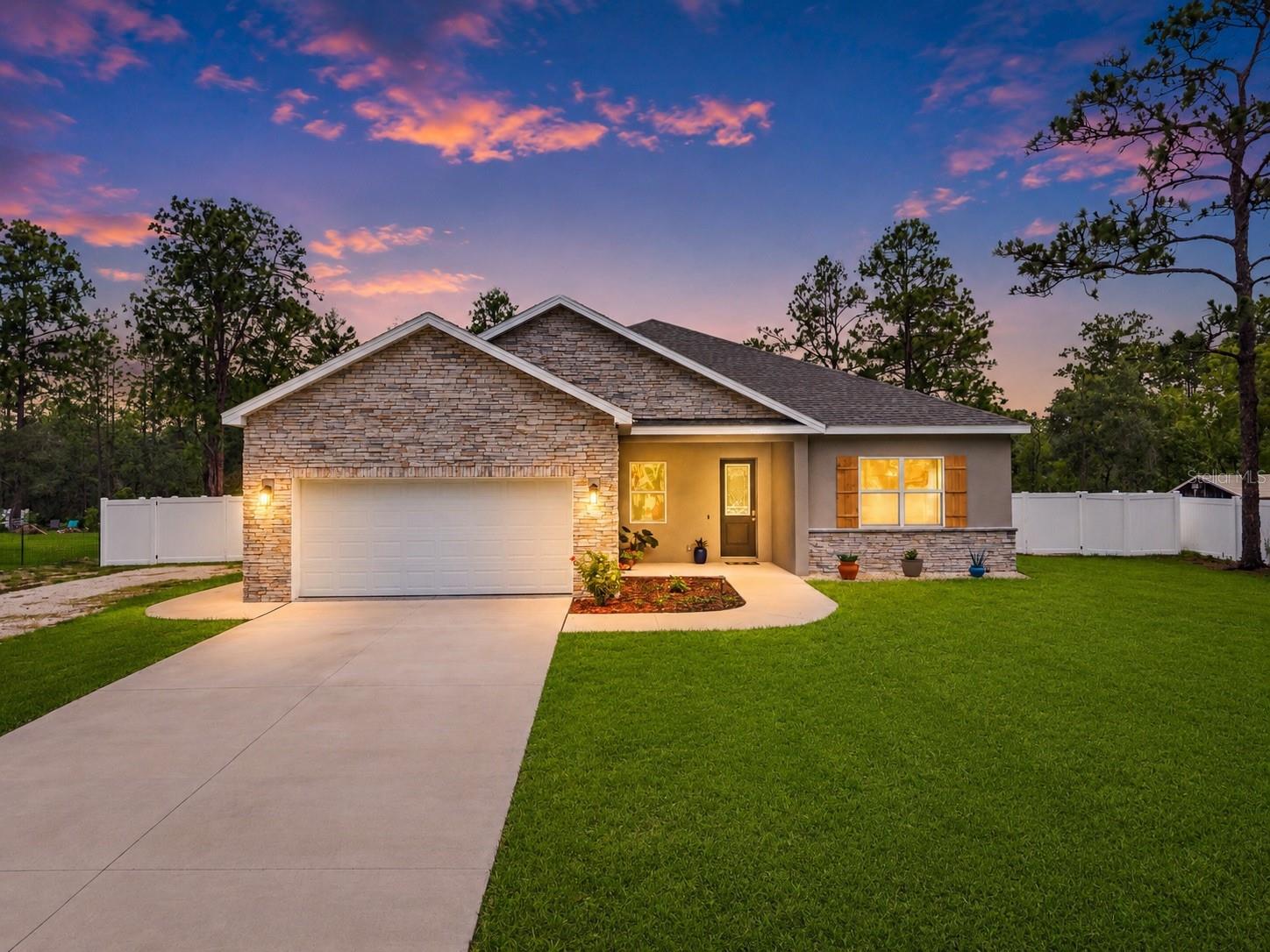 Virtually Staged. BUILT IN 2024 + HALF ACRE LOT + 4 BEDROOMS + FENCED YARD + SHED + HOT TUB + COVERED BOAT OR VEHICLE STORAGE with 30 AMP RV hookup+ NO HOA + NO CDD + NO FLOOD ZONE!!! 

THIS IS WHAT NEW CONSTRUCTION SHOULD ACTUALLY OFFER!!!

11153 Wood Owl Avenue, Weeki Wachee. BUILT IN 2024 by Southern Crown Homes on a HALF ACRE LOT on a Paved Road. No HOA + No CDD + No Flood Zone!!! This one was built to last and built to save you money every single month.

This home is constructed with ICF -- Insulated Concrete Form -- walls. That means poured concrete reinforced with steel, sandwiched between layers of foam insulation. The result is a home that is incredibly strong, energy efficient, and resistant to wind, fire, and pests!!!

FOUR BEDROOMS + 2,124 Square Feet of Living Space + OPEN FLOOR PLAN + Soaring Ceilings + 10-Foot Flat Ceilings throughout!!! Light, bright, and exactly what people picture when they say they want an open concept home. LUXURY VINYL PLANK FLOORING runs throughout -- no carpet anywhere!!! 

Upgraded Baseboards + Upgraded Front Door + Interior Doors (no bifold doors here) + a 72-Inch Fan in the living room + High-End Lighting + Window Coverings already installed.

The Kitchen has a DEEP FARM SINK + Tile Backsplash + Soft-Close Cabinets and Drawers!!! Real upgrades, not just listing buzzwords.

The PRIMARY SUITE is a dream -- huge room + Large Bathroom with Custom Cabinetry + Soaking Tub + Walk-In Shower + MASSIVE WALK-IN CLOSET!!!

The Garage is fully Finished + Insulated + Insulated Garage Door. Plus a COVERED CARPORT FOR BOAT OR VEHICLE STORAGE with Solar Panels for Charging + EV Charging Station + 30-Amp RV Hookup!!! Whatever you drive, tow, or store -- this property is set up for it.

Out back, an Extra Large Covered Lanai overlooks a FULLY PRIVACY-FENCED YARD with Two Double Gates + an 8x12 SHED + a HOT TUB under a Covered Patio!!! 

A Wireless Alarm System + 50-Gallon Hot Water Heater round out the upgrades. Traditional Septic System -- not the new alternative style.

Curb appeal delivers too!!! Stone Accents + Wood Shutters + Covered Front Porch + Upgraded Front Door set the tone before you even walk in.

Zoned for Winding Waters K-8 and Weeki Wachee High School. Minutes from Weeki Wachee Springs + the Weeki Wachee River + Homosassa + Hernando Beach. Under an hour to Tampa, but it feels like a world away!!!

$450,000. New construction that actually delivers. Schedule your showing today!!!