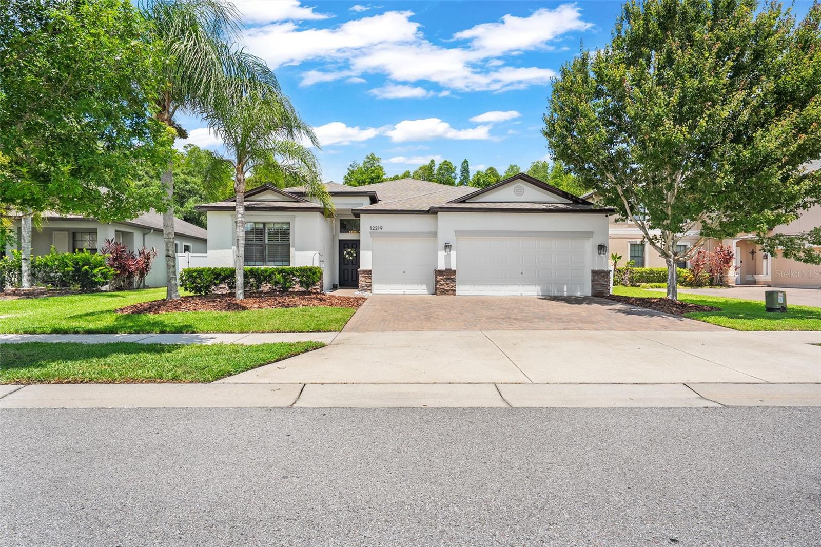 Clean 4-Point Inspection! Exquisitely maintained and fully remodeled home in the highly sought after gated neighborhood of Trinity Preserve, this stunning 4-bedroom, 3-bath, 3-car garage home is truly move-in ready and showcases pride of ownership throughout. Featuring luxury vinyl plank flooring, beautiful quartz countertops, designer finishes, and thoughtful upgrades in every room, this home offers the perfect blend of modern style and everyday comfort. The spacious open-concept floor plan is ideal for both entertaining and daily living, with abundant natural light and seamless flow between the living, dining, and kitchen areas. The beautifully updated kitchen serves as the heart of the home, offering ample counter space, modern cabinetry, and elegant finishes. Retreat to the spacious primary suite, while three additional bedrooms and two additional bathrooms provide plenty of room for family and guests. Step outside to enjoy your private backyard fully screened in lanai with no rear neighbors, creating a peaceful setting rarely found. Located in a sought-after community zoned for A-rated schools and close to shopping, dining, parks, and major commuter routes, this turnkey home offers the lifestyle today's buyers are looking for.