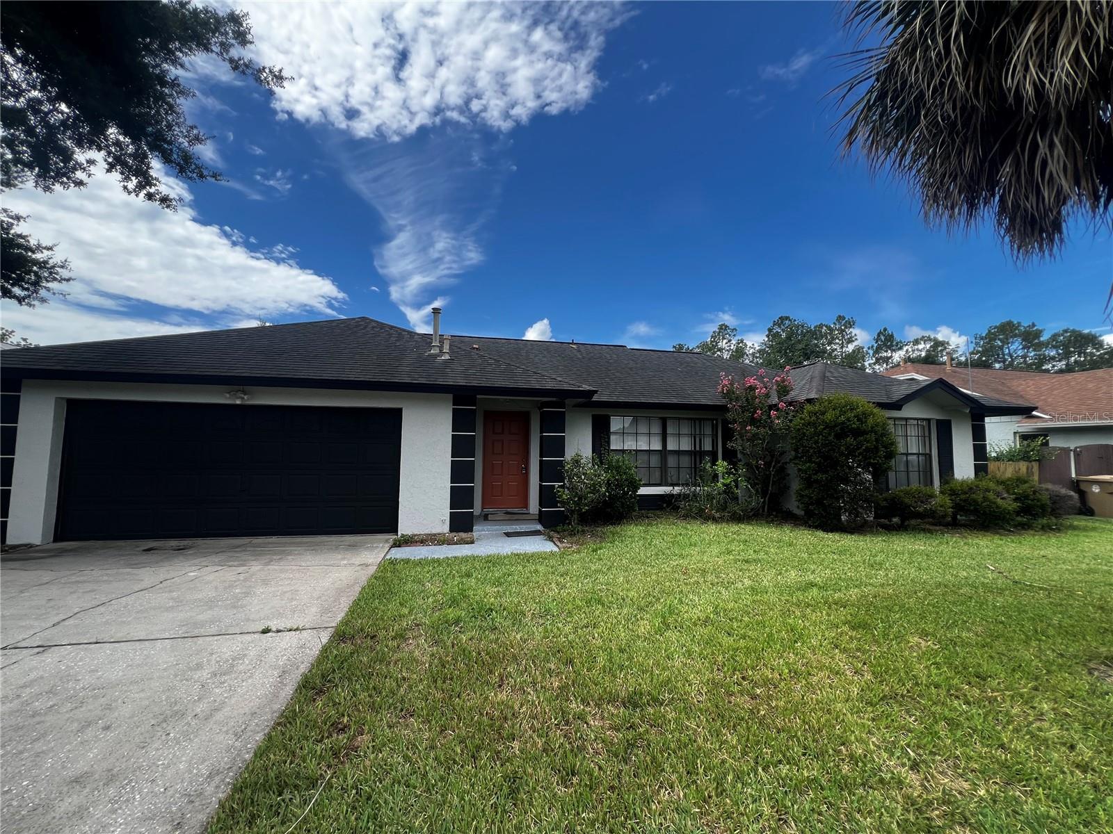 Welcome to this beautifully maintained 4-bedroom, 2-bath pool home in the desirable Indian Ridge community, just minutes from Walt Disney World, major attractions, shopping, dining, and top-rated golf courses. Whether you're searching for a primary residence, vacation home, or short-term rental investment, this property offers exceptional flexibility and location.

Step inside to find a bright, open floor plan with spacious living and dining areas, a well-appointed kitchen, and generously sized bedrooms designed for comfort and functionality. Sliding glass doors lead to a private screened lanai with a sparkling in-ground pool, creating the perfect setting for relaxing or entertaining year-round.

The attached garage has been thoughtfully converted into a versatile entertainment/game room, providing additional recreational space for family and guests. Should you prefer traditional parking or storage, the conversion can be easily restored to a full 2-car garage.

Situated on a north-facing lot with low annual HOA dues, this home offers easy access to major highways, Orlando International Airport, and Central Florida's world-famous attractions. Don't miss this incredible opportunity to own a move-in-ready home in one of Kissimmee's most sought-after communities.