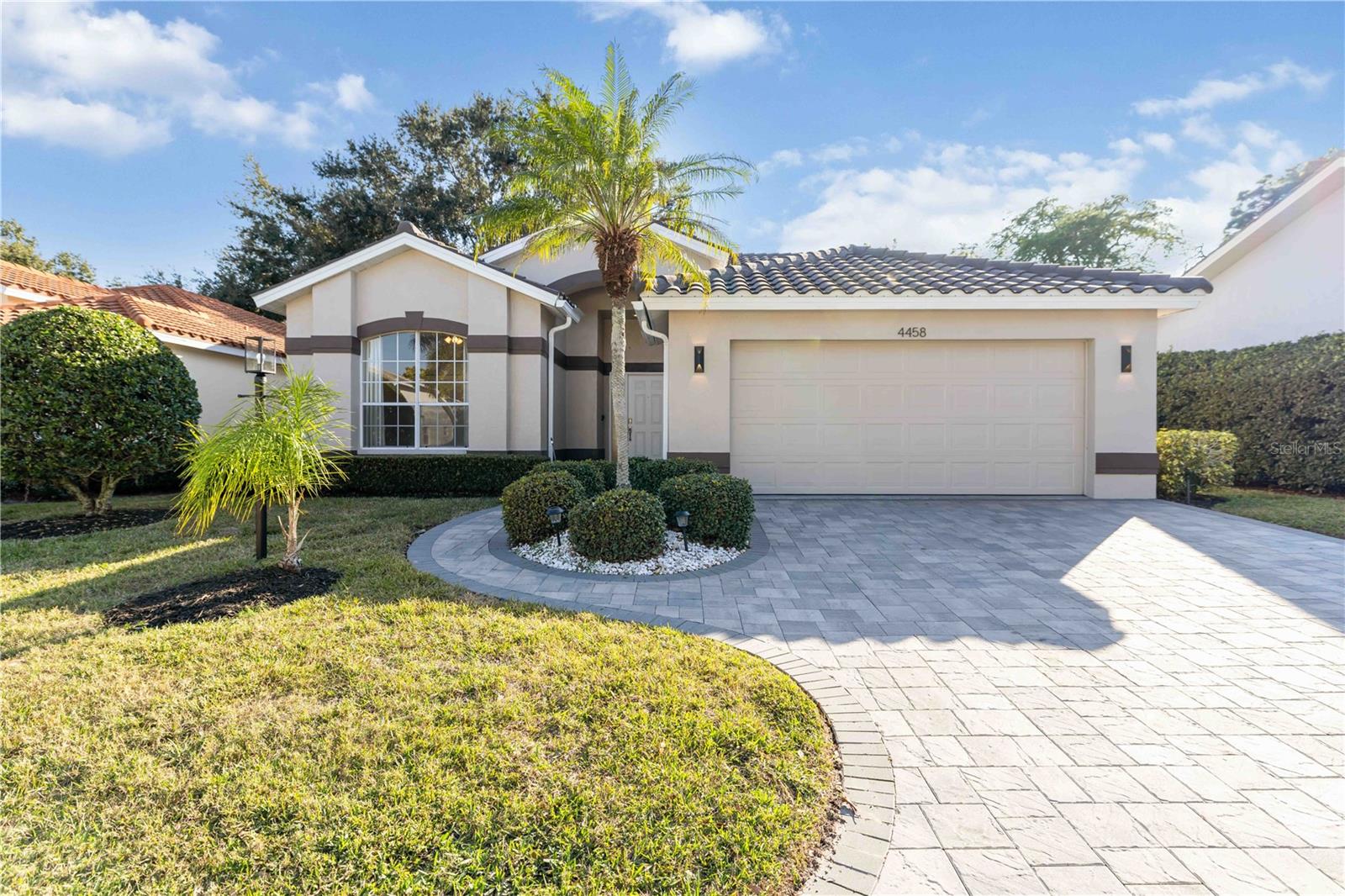 Step into a beautifully maintained pool home surrounded by a peaceful, park-like setting and perfectly positioned for Sarasota living. This property sits on the quiet side of the neighborhood, away from University Parkway traffic, and backs up to the conservatory, offering rare privacy and a calm natural backdrop.
The location is exceptional. Enjoy being five minutes from the shopping and dining at UTC, Nathan Benderson Park, and I-75. SRQ Airport is just ten minutes away, and St. Armands Circle and Lido Key are only twenty minutes from your doorstep.
Inside, the bright, open floor plan is enhanced by thoughtful updates throughout. Recent improvements include a whole-home repipe, new roof, fresh exterior paint, driveway and patio pavers, a fenced backyard, updated landscaping, new French doors, new garage door opener, updated fans, new electrical in the bedrooms, a home water softener, smart thermostat, and a refreshed salt cell.
The light and airy kitchen features hard-surface counters, a separate breakfast nook, and new oven, dishwasher, and faucet. Laminate wood floors anchor the great room, while tile and carpet complement the bedrooms.
The spacious primary suite offers his-and-hers walk-in closets and a remodeled bath with a walk-in shower, dual sinks, and a garden tub. The guest bedroom includes a full-wall closet, and the third bedroom is ideal for a den, office, or flexible use.
A heated and cooled Florida room overlooks the private backyard, creating a comfortable space to enjoy the view year-round. Outside, the screened lanai surrounds the pool with a newer pump, and the newer A/C system provides added peace of mind.
Tranquility, convenience, and thoughtful updates come together seamlessly in this Sarasota home.  Some photos have been virtually staged.
