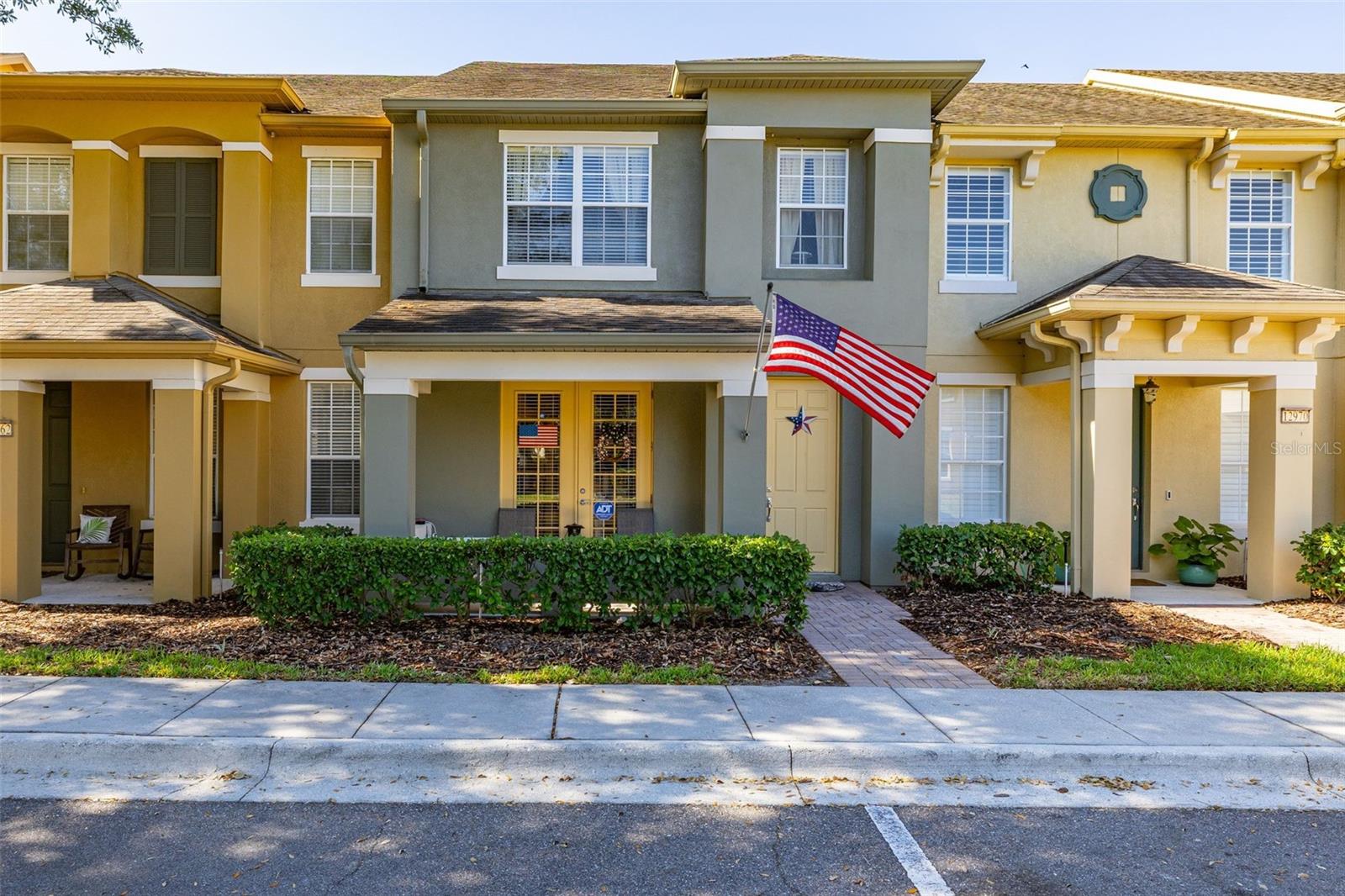 PRICE ADJUSTMENT! Discover the perfect blend of comfort and convenience in this spacious 3-bedroom, 2.5-bath townhouse located in the highly sought-after Lake Sawyer South community in Windermere.
Surrounded by picturesque, tree-lined streets, this well-maintained home welcomes you with a bright and open kitchen area featuring  granite countertops, stainless steel appliances, and a walk-in pantry. The open living area with elegant French doors lead to a private, paved courtyard that seamlessly connects to the detached 2-car garage—perfect for indoor-outdoor living. The first floor is complete with a spacious laundry room and a half bath. Upstairs, the expansive primary suite offers a peaceful retreat with a dual vanity en suite bath, while two additional bedrooms share a full bathroom—ideal for family, guests, or a home office setup. A conveniently located downstairs laundry room adds everyday ease. Residents enjoy access to exceptional community amenities, including parks, scenic walking trails, playgrounds, tennis and basketball courts, and a resort-style swimming pool. The HOA provides added value by covering lawn care, exterior painting, and the roof—offering low-maintenance living and peace of mind. Located in the charming town of Windermere, known for its top-rated schools and high quality of life, this home is just minutes from Walt Disney World, major highways, upscale dining, and premier shopping destinations. This is one of the best values in the area—schedule your private showing today!