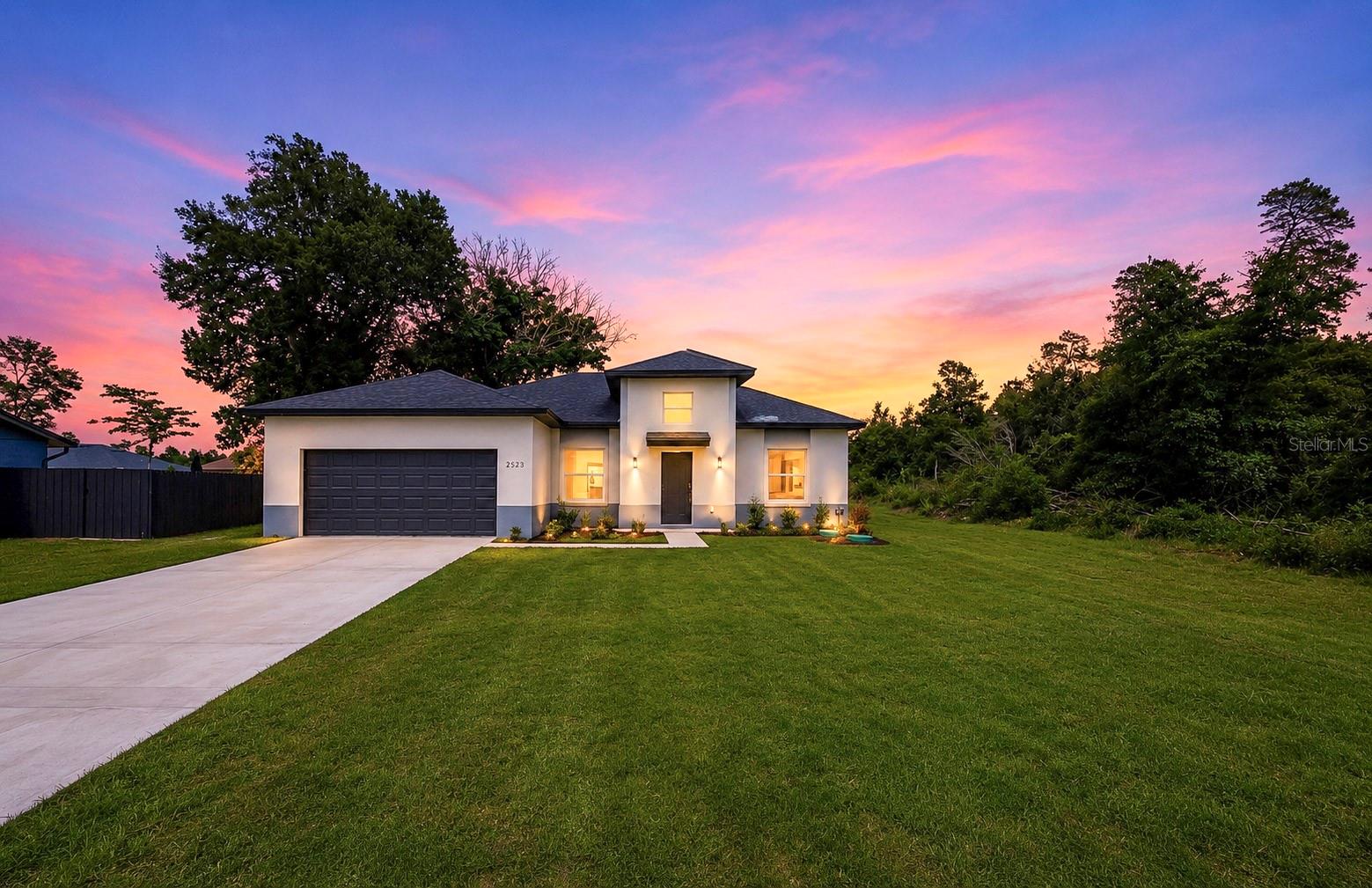 This is the same highly desirable Ruby model as our recently pending listing—  Here is what's different about this New Construction — Bigger Heated Square Footage and — 10-ft High Ceilings throughout! — Statement window above the front entry for beautiful natural light— Spacious Primary Suite with huge walk-in closet— Spa-style Primary Bathroom featuring freestanding Soaking Tub, Fully Tiled walk-in shower, dual vanities, and private window— Side privacy and a beautiful mature tree in the backyard for a more serene setting— Patio with outdoor kitchen rough-ins, ideal for entertaining— Large kitchen with abundant cabinet space and pantry— All appliances included — Washer & Dryer too— Home warranty included for added peace of mind— Seller Credits available — Staged photos and 3D tour are from staged listing of the exact same model.—Front/Back, Vacant photos,  Floor Plan and Video are of this property.