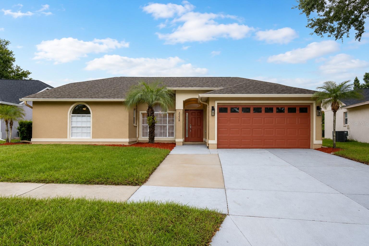 Welcome to 2229 Foggy Ridge Parkway in Land O' Lakes, where this beautifully renovated 4-bedroom, 3-bathroom home offers approximately 2,000 square feet of thoughtfully designed living space with peaceful waterfront views. Every detail has been updated with high-quality finishes, creating a truly move-in-ready home.

The open-concept floor plan features a designer kitchen complete with quartz countertops, custom cabinetry, a large center island, and brand-new stainless steel appliances. The spacious living and dining areas flow seamlessly together, providing an ideal setting for everyday living and entertaining while overlooking the water.

The primary suite serves as a private retreat with a fully renovated spa-inspired bathroom featuring premium finishes and modern fixtures. The additional bedrooms are generously sized, and all bathrooms have been tastefully remodeled with contemporary finishes. New flooring, updated lighting, fresh interior paint, and upscale fixtures throughout complete the home's luxurious feel.

Step outside to the screened lanai and enjoy serene waterfront views, offering the perfect place to relax after a long day.

Residents also enjoy access to the community swimming pool, providing an additional recreational amenity just moments from home.

Conveniently located near shopping, restaurants, top-rated schools, medical facilities, and major roadways with easy access throughout the Tampa Bay area, this exceptional rental combines luxury finishes, modern updates, and an excellent location.