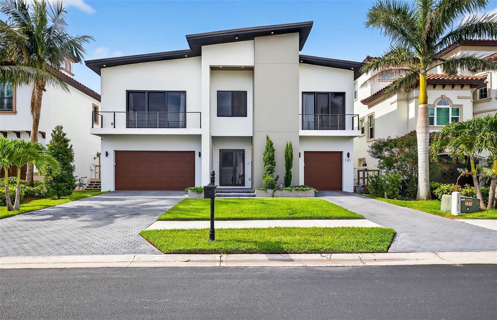 This exquisite custom-built, new construction coastal contemporary home features 4 bedrooms, 3.5 baths, and is situated in the prestigious and guard-gated Redington Shores Yacht and Tennis Club. This newly constructed, open-concept layout with 12 ft ceilings boasts an abundance of natural light and luxurious finishes throughout. You will find hurricane impact-rated windows and doors and a commercial style dual sided elevator which provides convenient access from the garage and foyer to the main living area. The expansive kitchen flows perfectly to the great room and is wonderful for entertaining, featuring high-end appliances, an oversized island, Italian cabinetry, quartz counters and a spacious dining area. The primary bedroom is well-appointed with a rich walk-in closet, a grand shower, floating cabinetry, and a soaking tub. There are 2 generous sized guest bedrooms with walk-in closets, and en suites. The home also includes a fourth bedroom currently being used as an office and laundry room with ample storage. The first floor offers an abundance of bonus space. Please call for a copy of the floor plan and to discuss the endless design possibilities. You will enjoy indoor/outdoor living on the spacious balcony or terrace, which overlooks the heated or cooled saltwater pool and spa, perfect for year-round enjoyment. The home is located in a resort-style community just steps away from the Beach and offers a range of amenities that set it apart from other communities in the area. These include 24-hour security, tennis and pickleball courts, a clubhouse with a fitness center, a community spa, a pool, and a kayak/paddleboard launch, as well as a fishing dock. The location of this home offers easy walking or golf cart access to the beach, many restaurants, bars, shops and the Redington Village. Nearby is Tampa International Airport, Downtown St. Petersburg, pro sports stadiums, entertainment, museums and all of the BEST that Tampa Bay has to offer! Deeded docks with lifts are able to be purchased by residents when available.
