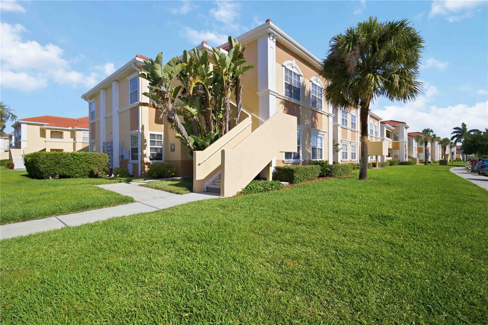 This charming and spacious 2/2 top floor corner unit is available now for annual rent. The condo features its own entrance/staircase and has new carpet throughout the common spaces and tile flooring in the bathrooms and kitchen. You’ll like the unit’s feel right as you enter the living / dining room area with the high tray ceilings. Glass sliding doors lead out to your private covered lanai and bring in lots of natural light. The kitchen with breakfast bar completes the open feel and has plenty of storage. The primary bedroom includes a roomy walk-in closet and an en-suite bathroom with a shower. The second bedroom is located on the other side of the unit, providing privacy and ample closet space. A guest bathroom with tub is right next door. A designated office nook plus a laundry closet with washer and dryer finish the unit off. The unit is nestled within the gated Villagio condominium association, minutes away from downtown Sarasota, shopping and the beautiful beaches, with easy access to 301, I75 and public transportation. Community amenities include a heated resort-style pool, tennis court, playground and gym. Rent is set at $1650 (no utilities included). First month's rent and a security deposit (equal to one month's rent) are required prior to moving in. RoseBay International Realty does not manage this rental property; we are solely helping the landlord to secure a new tenant. Call today to set up a showing or virtual tour.