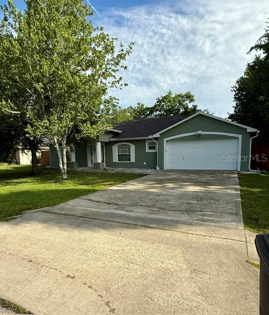 Welcome to this spacious and well-maintained 3-bedroom, 2-bath home offering over 2,000 square feet of comfortable living space in the heart of Palm Coast. Designed with both everyday living and entertaining in mind, this home features a formal living room, dining room, and a large family room, providing plenty of space for gatherings and relaxation.
The oversized kitchen offers abundant cabinet and counter space, making meal preparation a breeze while remaining the central hub of the home. The split-bedroom floor plan provides privacy for the large primary suite, while the additional bedrooms offer flexibility for family, guests, or a home office.

Step outside to enjoy the fully fenced backyard, perfect for pets, play, gardening, or outdoor entertaining. Conveniently located near shopping, dining, schools, parks, and just a short drive to Flagler Beach, this home combines space, comfort, and a desirable Palm Coast location.
Don't miss the opportunity to make this beautiful property your new home!