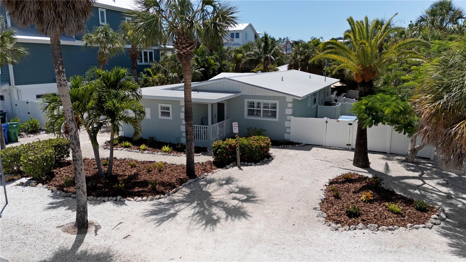 Discover the ultimate island retreat just three homes from the sugar-white sands and turquoise waters of the Gulf of Mexico. Situated on an oversized 8,250-square-foot lot, this beautifully appointed 4-bedroom, 3-bath home offers nearly 1,700 square feet of coastal living and features a desirable open floor plan designed for gathering and entertaining. The thoughtfully designed layout includes two spacious ensuite bedrooms, a fun bunk room perfect for younger guests, and plenty of room to relax after a day at the beach.
Step outside to your own private tropical oasis. The heated pool invites you to enjoy sunny afternoons and evening swims under the stars, while the expansive backyard offers abundant space for lounging, grilling, and making memories with family and friends. The generous lot size is a rarity on Anna Maria Island and provides a true sense of privacy and room to spread out. Along the side of the home, an outdoor game area creates the perfect setting for friendly competitions and endless entertainment after a day spent on the beach.
Ideally located in the heart of Anna Maria Island, you're just a short stroll to the boutiques, restaurants, and vibrant atmosphere of Pine Avenue, as well as the island's world-famous beaches. Whether enjoying spectacular Gulf sunsets, dining at one of the island's favorite eateries, or relaxing poolside with loved ones, this home embodies the laid-back luxury of island living.
With a proven history as a successful short-term rental and exceptional investment opportunity, this turnkey property offers the perfect blend of lifestyle and income potential. Rarely do homes on oversized lots this close to the Gulf become available. Experience the very best of Anna Maria Island and own your own slice of paradise, where every day feels like a vacation.  Come live the Anna Maria Life!