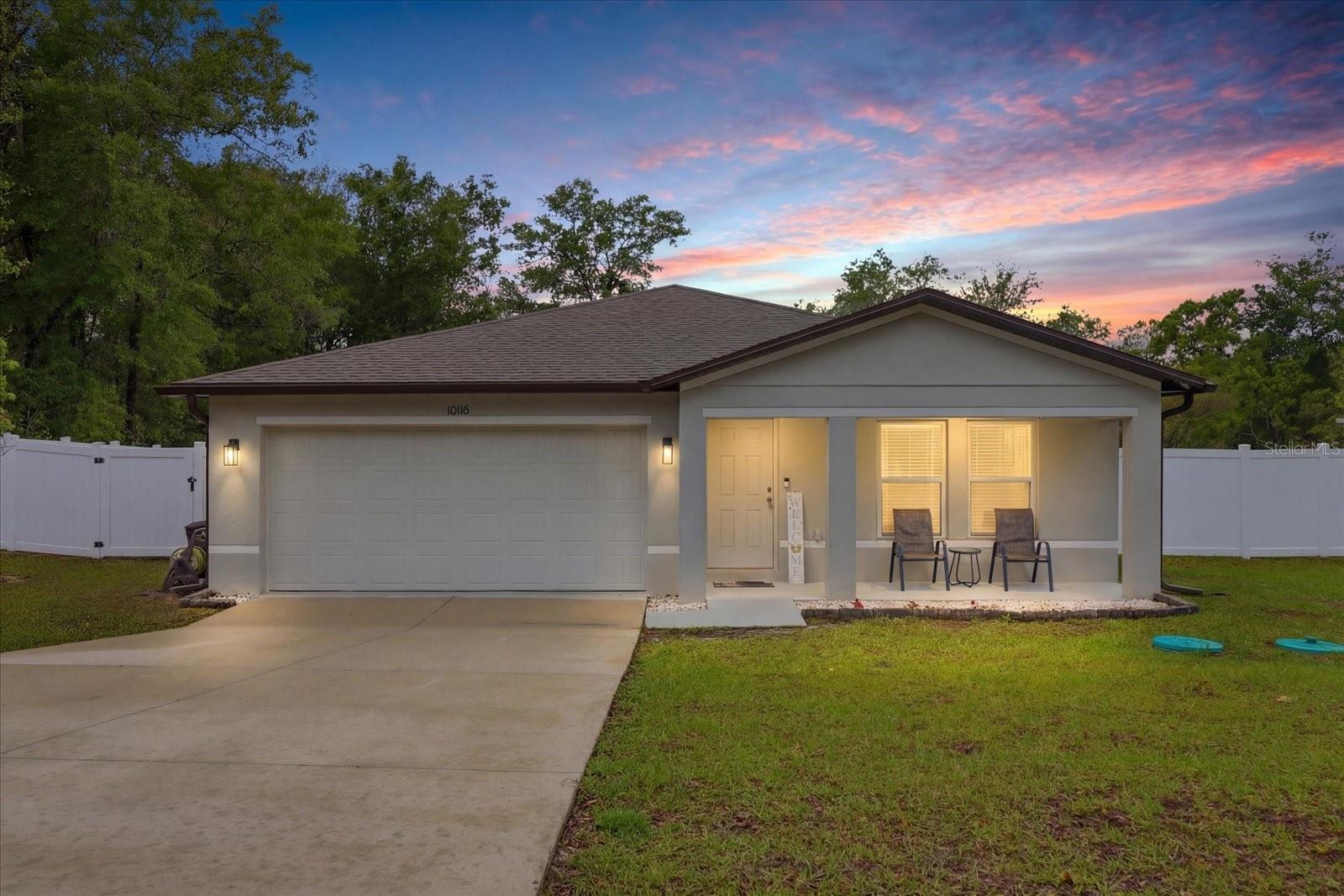 Welcome to your own slice of paradise along Florida's Nature Coast! This stunning 2024 built home perfectly captures the essence of the Florida lifestyle, blending modern sophistication with the laid-back, tranquil atmosphere that defines Citrus County. Designed for both efforless daily living and vibrant entertaining, the open concept floor plan is anchored by a chef-inspired kitchen. Whether you are prepping a fresh catch or hosting a weekend brunch, you'll appreciate the granite countertops and sleek stainless steel appliances, while enjoying the expansive view overlooking the living room, keeping you connected to the conversation. Durable, modern vinyl plank flooring flows seemlessly throughout the entire home. With 4 spacious bedrooms and 2 bathrooms, there is plenty of room for family, guests or a dedicated home office. The primary suite serves as a private sanctuary, featuring a generous walk-in closet and a refined ensuite bathroom with dual sinks. Step outside to experience the best of Florida's outdoor living. The backyard is fully enclosed by a vinyl privacy fence, creating a secluded retreat for cooling off in your screened-in, salt-system swimming pool, hosting summer BBQs and utilizing the on-site shed for all your gardening tools or outdoor gear. Citrus Springs offers the ultimate "best of both worlds" location. You are just minutes away from several hiking/biking trails, state parks, rivers, lakes, fresh water springs AND the Gulf of Mexico. Enjoy world class fishing, boating, swimming, diving, kayaking, paddleboarding, scalloping and swimming with our world famous manatees! Conveniently positioned for an easy commute to Tampa, Orlando, Ocala, Gainesville and more!