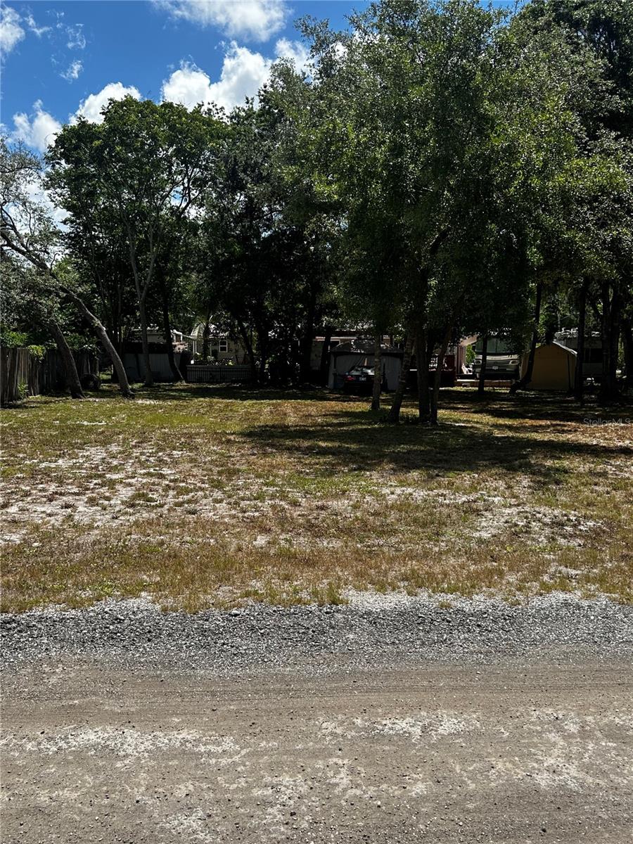Here is a clean residential land opportunity with simple, straightforward potential. This 7,700-square-foot parcel offers a practical footprint with approximately 62 feet of frontage and lot dimensions of 62x110x79x110, giving future owners a manageable canvas for planning, building, or holding as part of a long-term investment strategy.

The property is fee simple, zoned AR, and located in Flood Zone X, with no HOA and no CDD listed—key details that make the lot even more appealing for buyers looking for flexibility and fewer ongoing restrictions. With no water or sewer currently connected and utilities listed as other, this is a true blank slate, ready for due diligence and a vision-driven buyer to explore what is possible.

Whether the goal is to secure land now, create a future homesite, or add another parcel to an investment portfolio, this lot offers the essentials: ownership, space, and opportunity. Bring your builder, walk the property, and imagine what can come next. Land is where every big idea starts—and this one is ready for its next chapter.