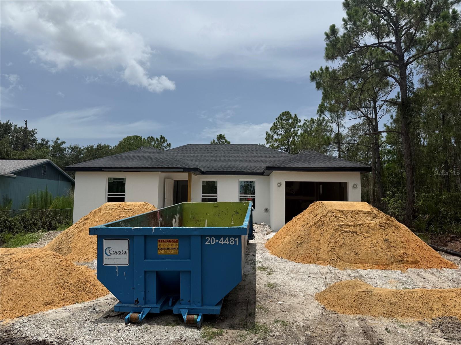 Pre-Construction. To be built. Seller will cover buyer's closing costs if you use sellers mortgage lender! BRAND-NEW CONSTRUCTION expected to be completed in approximately 30 days! This thoughtfully designed 3-bedroom, 2-bath home offers 1,059 square feet of air-conditioned living space, an attached one-car garage, and a comfortable single-level floor plan. Porcelain tile flooring will extend throughout the entire home, creating a clean, cohesive look with easy maintenance. The kitchen features solid wood soft-close cabinetry, quartz countertops, stainless steel appliances, and ample workspace, while both bathrooms include quartz countertops and porcelain-tiled shower and tub surrounds. Energy-efficient features include impact-resistant E-glaze windows, high-efficiency air conditioning with a heat pump, CBS block construction, R-30 ceiling insulation, LED lighting, ceiling fans with remote controls, and a programmable thermostat. Additional features include window blinds, premium interior doors and trim, brushed-nickel hardware, a Ring doorbell, washer and dryer, electric garage door opener, gutters and downspouts, landscaping, an asphalt driveway with culvert, and a remote-controlled 10-by-12-foot electric awning over the rear patio. Located in the growing Tropical Gulf Acres area of Punta Gorda with convenient access to shopping, dining, boating, and everything Southwest Florida has to offer. USDA financing with no down payment may be available for qualified buyers, subject to lender and USDA approval. Secure this new home now and prepare to move in soon!
