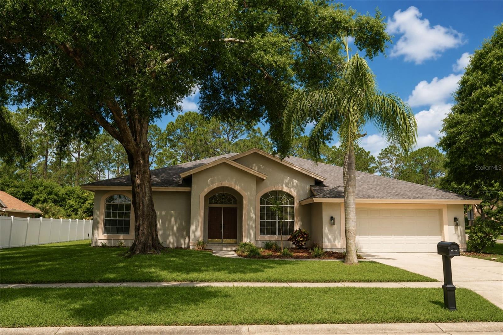 Welcome to 17316 Hialeah Dr in Odessa! Located in the highly sought-after Van Dyke Farms community. This move in ready home offers 4 bedrooms, 3 bathrooms, 2,671 sqft of living space, and a 2-car garage. Recent updates include new flooring, fresh paint, and a new roof. 

The kitchen features new countertops, stainless steel appliances, and an abundance of cabinet space. A pass-through kitchen window connects directly to the screened-in lanai bar area, while four sliding glass doors create a seamless indoor/outdoor flow that's perfect for entertaining. The home also offers a dedicated dining space, and a second living room complete with additional built-in cabinetry and a fireplace. 

The master bedroom opens directly to the screened-in lanai through sliding glass doors and features a huge walk-in closet along with an en-suite bathroom complete with dual vanities, freestanding tub, and separate walk-in shower. The back bedroom offers dual closets and sits next to another bathroom with a walk-in shower. Bedrooms three and four are tucked behind a stylish sliding barn door and share an additional bathroom. Attached to the garage is a dedicated utility/laundry room with a sink for added convenience. 

Van Dyke Farms is known for its exceptional amenities and convenient location near the Suncoast Parkway, TPC Tampa Bay Golf Course, shopping, dining, parks, and nature preserves. Residents enjoy access to tennis and pickleball courts, basketball courts, playgrounds, sports fields, walking and biking trails, fishing lakes, and more. Schedule your showing today!