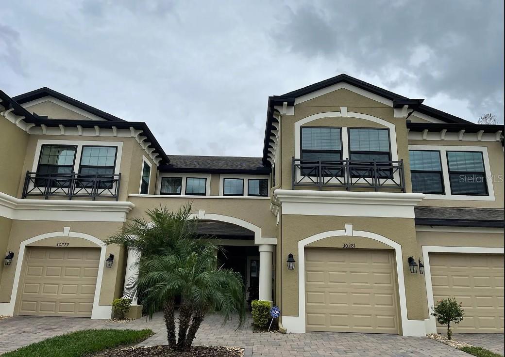 Available Early August! Stunning 3 bedroom/2.5 Bathroom/1 Car Garage townhouse located in Windermere Estates at Wiregrass Ranch. The house offers an open floorplan including a huge living room, large kitchen with 42 wood Cabinets, granite countertop and SS appliances, Tiles on the first floor, carpet on the 2nd floor. Private screened lanai with a conservation view. This Property is conveniently located near I-75, hwy 56, and A-rated schools along with groceries store, malls, and restaurants.