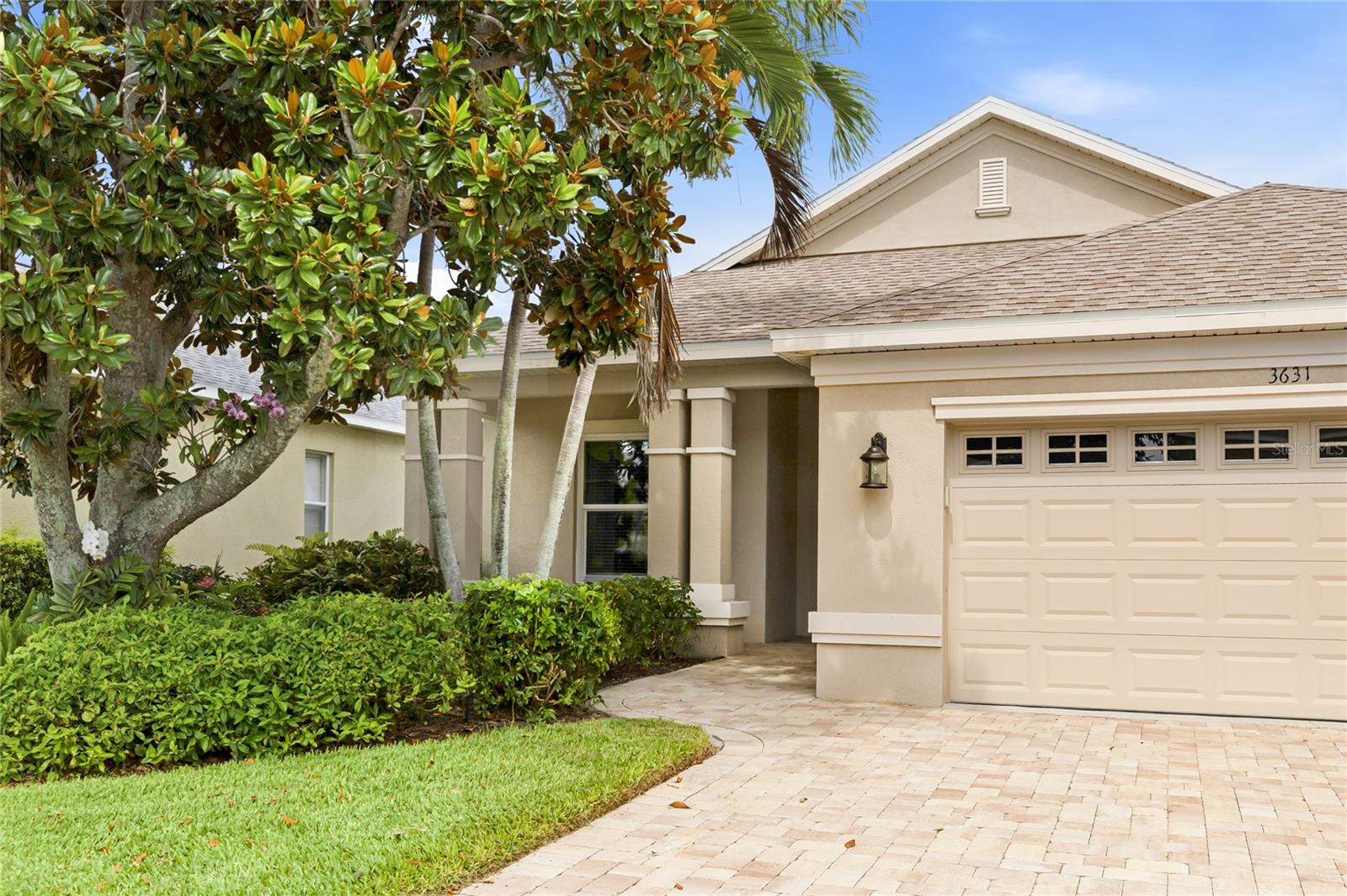 Enjoy the tranquility of a waterfront home with fantastic water views! It is all about the location and the community, maintenance free lawn, heated pool in the community, gym, walking trails just a short drive to Anna Maria Island Beaches. Discover your dream home all the work is done Meticulously maintained new tile flooring (2024) throughout, new roof (2022), New hurricane windows (2024), New Hurricane Kevlar screen, master bedroom is spacious with two closets, big picture windows with water views. Master bathroom has his and her vanities, nice walk-in shower with new shower door, linen closet bathroom cabinets have been painted. The home has been professionally painted, new blinds and custom drapery in dining room and across the sliding doors.  Beautiful arched doorways, crown molding, rounded corners on the walls, front porch, screened back porch, updated kitchen with lots of cabinetry, new refrigerator, very bright breakfast area. 
Formal dining room with big picture window that brings in lots of natural light. Oversized family room with trey ceiling, and views of the water.  Enjoy mornings drinking coffee watching the ducks and water birds playing in the water.  In the evenings you can sit on the front porch and watch as neighbors walk their dogs. Enjoy your paver driveway that was made extra wide for ample parking.  Laundry room has cabinetry, sink, and a washer and dryer that was purchased in (2021).  This home has very nice blinds, and shades that have been recently replaced some are Hunter Douglas blinds.  Relaxenjoy the pool and the location to Anna Maria Island beaches. Just 6 miles to the beach!!