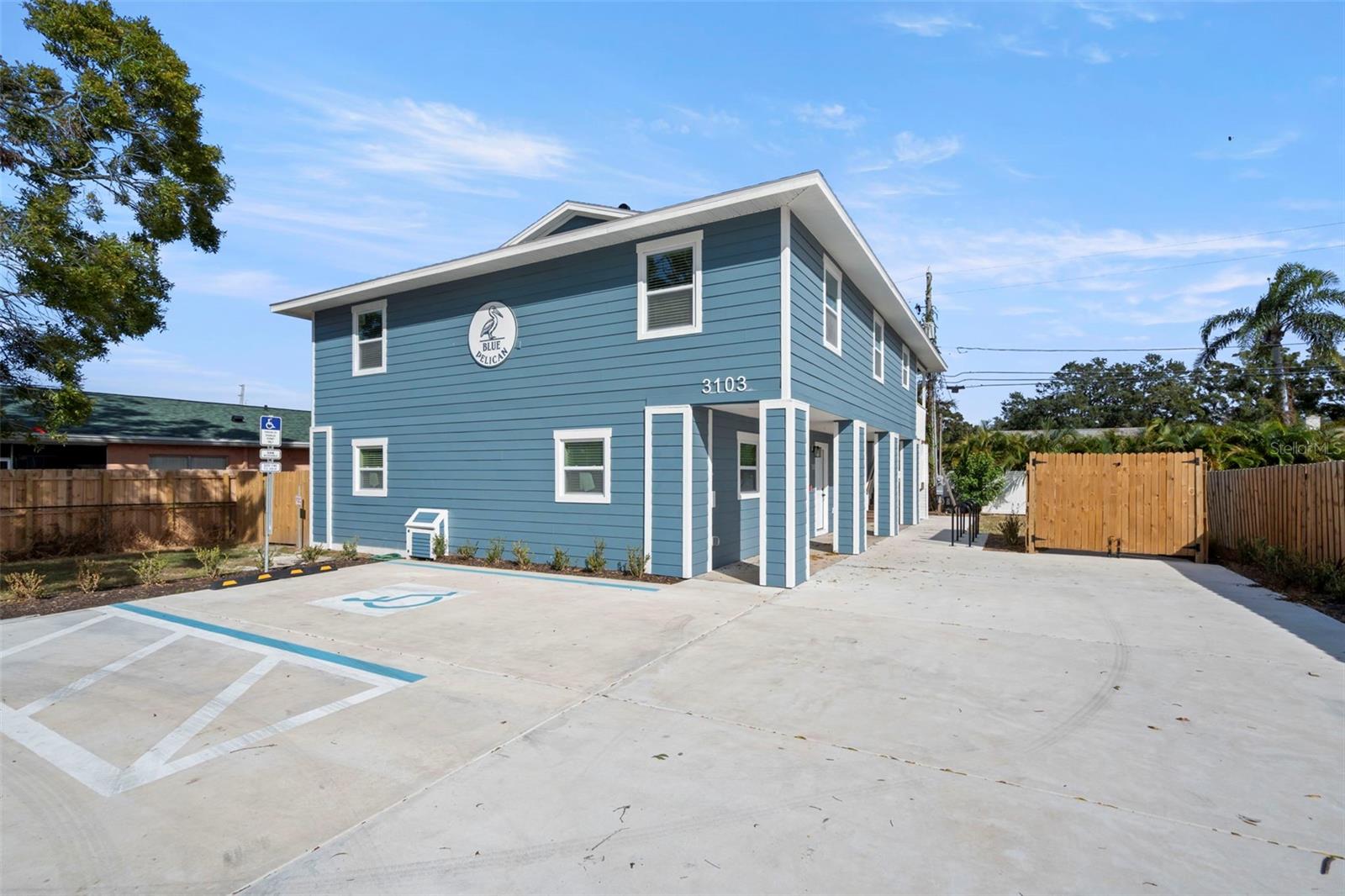 Introducing Blue Pelican, a brand-new commercial-quality quadplex rebuilt from the studs up. Only portions of the exterior framing and slab remain—every other major component is new, including the electrical system and panels, plumbing, roof, HVAC, siding, impact-rated windows and doors, driveway, insulation, drywall, upscale kitchens and bathrooms, and all interior finishes. The property also features a commercial fire sprinkler system and a commercial fire alarm system, offering insurance advantages, enhanced safety, and long-term durability rarely found in small multifamily assets.

The building lives more like a newly constructed boutique apartment building than a traditional four-unit. Each residence has been fully redesigned with modern layouts and high-end finishes, and one of the units is fully ADA compliant with an exterior wheelchair-accessible ramp. Additional upgrades such as designated bicycle parking and thoughtful site enhancements help ensure low-maintenance ownership for years to come.

The owners are currently replicating this project with the mirror-image property next door at 3101 16th St N, which will be completed as “Green Pelican” and will match Blue Pelican in layout, quality, and commercial-grade upgrades, with the only difference being a Seafoam Green exterior. Once completed, this will enhance the overall appeal and value of Blue Pelican, and a future purchaser will have the opportunity to acquire both properties for a cohesive and highly attractive 8-unit investment.

Fully leased the property will deliver a total monthly rental income of $8,825 plus an additional $200/month in reimbursement for water and trash, bringing the annual gross income to approximately $108,300. All units are separately metered for electric, creating an efficient and predictable utility structure.

Given the complete redevelopment and commercial-grade systems, future capital expenditure needs are minimal. Based on typical operating metrics for a brand-new, impact-rated multifamily building in Florida, the projected NOI supports a strong cap rate at list price. With rental upside over time, the pro forma performance trends even stronger.

Blue Pelican presents a rare opportunity to acquire a true turnkey, fully rebuilt income-producing asset with commercial-level construction quality, modern design, and stabilized rent roll—all in a growing, high-demand market near downtown St Pete and right around the corner from Crescent Lake.
