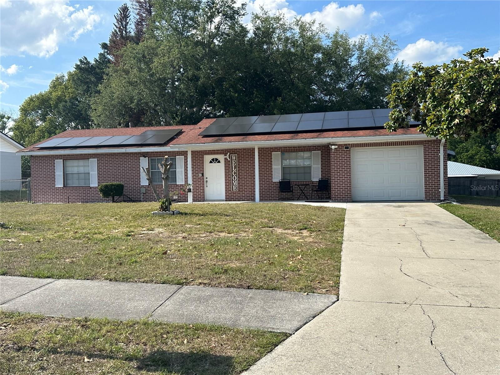 Charming and well-maintained home located in the heart of Lake Alfred! This beautiful property offers comfortable living with a functional layout, spacious living areas, and a welcoming atmosphere perfect for families or first-time homebuyers. The home also features a versatile bonus room, perfect for a home office, playroom, guest space, gym, or additional living area. Enjoy the added value of solar panels, helping reduce monthly utility costs and increase energy efficiency. Best of all, NO HOA! Conveniently located near shopping, dining, schools, parks, and major highways with easy access to nearby cities and attractions. Don’t miss this great opportunity to own a move-in ready home with modern energy-saving features and no HOA restrictions!