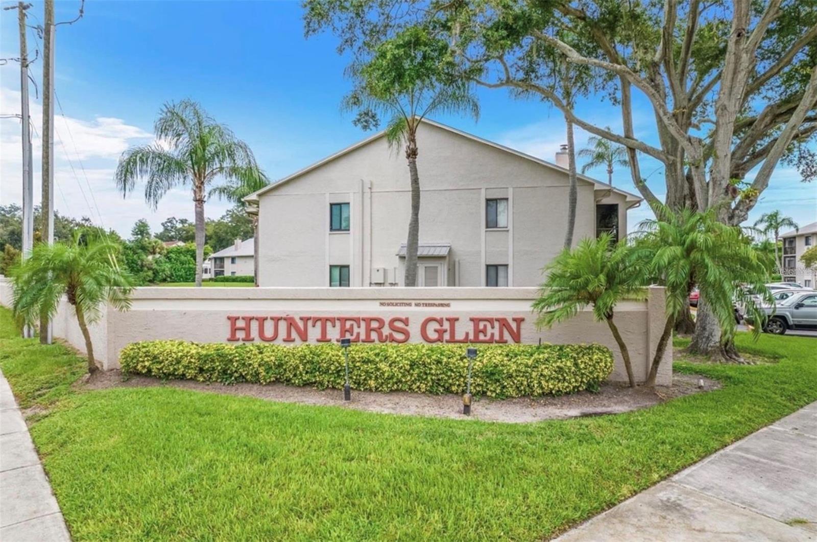Motivated seller! Welcome to your slice of Dunedin living. This move-in-ready 2-bedroom, 2-bath condo offers a functional split floor plan, with the guest bedroom and nearby full bath situated on one side—complete with two closets for extra storage. The primary suite is privately set toward the back, featuring a walk-in closet and an updated en-suite bathroom.The kitchen opens nicely into the main living space, creating an easy flow for everyday living and entertaining. Additional highlights include a screened-in lanai, in-unit laundry, and a convenient storage area just steps away.Located in the pet-friendly Hunters Glen community, residents enjoy a low HOA and access to a heated pool. Centrally positioned in Dunedin, you’ll be close to everything this vibrant area has to offer. Don’t miss your chance to make this beautifull condo your own. Schedule a showing today!
