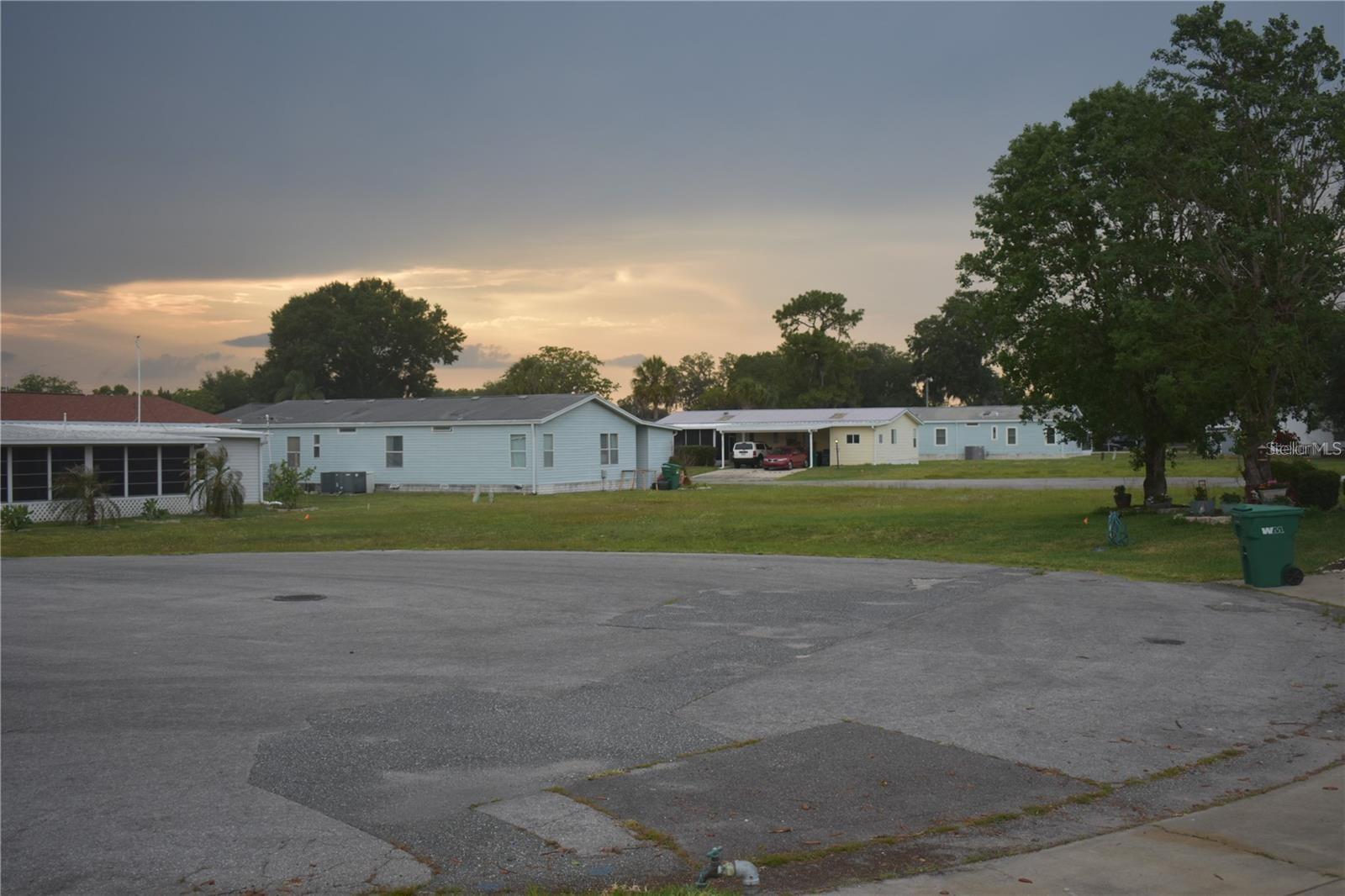 Your Florida Retreat Awaits – 55+ Community in Wildwood. Settle into the easygoing Florida lifestyle in this welcoming 55+ community, just minutes from Brownwood Town Center in The Villages. Several lots are available, perfect for placing your mobile home and enjoying year-round or seasonal living. (RVs not permitted.) Enjoy quick access to restaurants, shopping, medical offices, and entertainment, with I-75 nearby for day trips to beaches, parks, and attractions across the state. Low monthly HOA of just $75 keeps things affordable, and turn-key placement options are available to make the move-in process smooth and stress-free. A quiet, convenient location with everything you need close by—your next chapter starts here