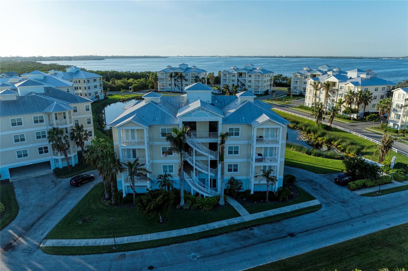 Luxury Condo at Palma Sola Bay Club. Located on the second floor, this 3 bedroom 2.5 bath residence offers an open floor plan with 10’ foot ceilings with expansive window views and ample natural sunlight. Other features include a private outdoor balcony overlooking a nature preserve, upgraded granite countertops and hardwood cabinetry. Palma Sola Bay Club is located just minutes away from the pristine beaches of the Gulf of Mexico. Conveniently located close to a variety of fine dining, entertainment and golf courses. Palma Sola Bay Club is a gated 30 acre preserve featuring an observation deck overlooking Palma Sola Bay. The two-story clubhouse features fitness center, billiards table, social room and two kitchens for entertaining. Outside you can enjoy a heated pool with an expanded deck for lounging, fire pit, and outdoor entertainment space complete with a wet bar, gas grill, bocce ball court, putting green, and kayak launch. Come enjoy the Good Life at The Palma Sola Bay Club. Rent Includes: Water, Garbage, Sewer, Cable, Internet, Grounds Care, Pool Maintenance, Recreational.