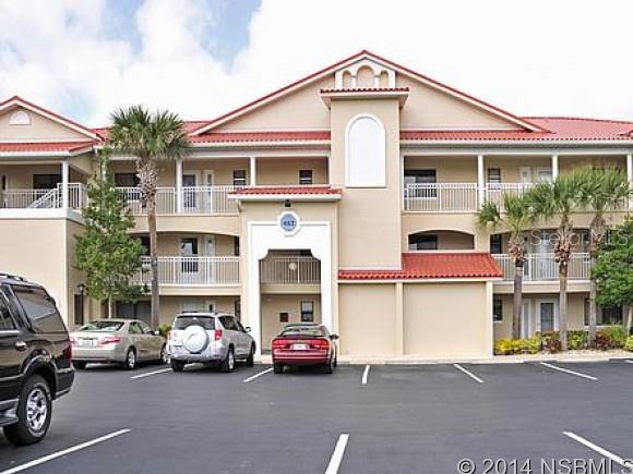 Beautifully renovated/upgraded first floor corner condo with enclosed porch with great views of the Intracoastal Waterway. 2 bedroom 2 bath with dry bar containing mirrored sides with glass shelves.  Kitchen, baths & closets updated with custom cabinets, plumbing fixtures and Corian counter tops.  Living room has tile which resembles wood planks & new carpet in bedrooms. Ceramic tile in Baths, Kitchen, Entry & Porch. Porch has sliding Plexiglas with window coverings thru out and a large closet to house your bikes, beach equipment and toys. Bouchelle Community amenities include a large clubhouse, 2 pools (one is heated) 2 lighted tennis courts,  BBQ grill area  and 18 hole chip and putt golf course. Boat ramp and secured boat storage available and a mile long boardwalk  along the riverfront. Only minutes to the beach. RARE OPPORTUNITY!! ;LocationDescription: Condo ;Water: City