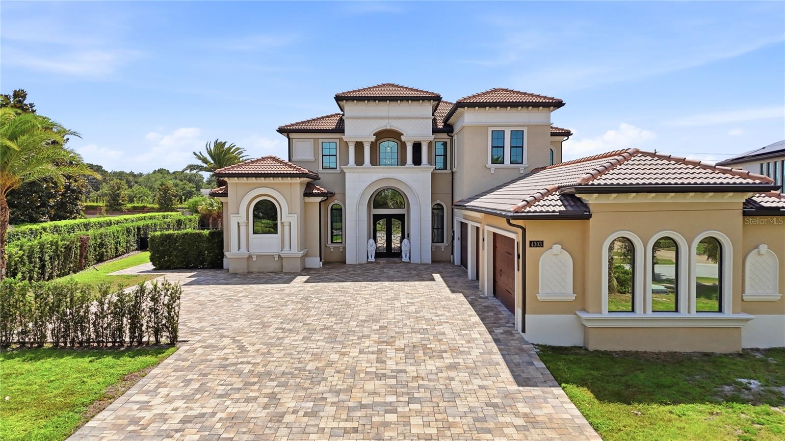 Located in one of Windermere’s most sought-after luxury GATED communities with 24-HOUR SECURITY-SCREENED ENTRY, Casabella, this exceptional custom-enhanced ESTATE showcases ultra-modern design, refined craftsmanship, and elevated INDOOR-OUTDOOR LIVING, offering impressive scale, custom design, and an exceptional lifestyle experience.

Designed with both scale and functionality in mind, the home features an OPEN-CONCEPT floor plan with 7 BEDROOMS, including a beautifully appointed MAIN-LEVEL Primary Suite with a spa-inspired bath, freestanding soaking tub, expansive dual custom-designed walk-in closets, oversized glass-enclosed shower, and integrated STEAM SAUNA. The main floor also includes an additional GUEST SUITE and 2 HALF BATHS.

Upstairs, 5 additional BEDROOMS, 2 FULL BATHROOMS, and a spacious LOFT create a well-designed secondary living retreat, offering flexibility for gathering, relaxation, and elevated everyday living.

The expansive DESIGNER-ENHANCED GOURMET KITCHEN serves as a striking centerpiece of the home, showcasing imported custom cabinetry, architect-inspired detailing, premium JennAir APPLIANCES, and seamless flow into the GREAT ROOM, multiple dining areas, and surrounding living spaces.

Additional interior highlights include a custom-designed EXECUTIVE OFFICE, luxury flooring throughout, ELECTRIC blackout shades, DIGITAL CODE LOCK entry systems on all bedroom doors for added privacy and convenience.

Across all 4 FULL BATHROOMS and 2 HALF BATHS, the home showcases floor-to-ceiling tilework, integrated bidet systems, and refined finishes throughout, while 1 HALF BATH offers direct OUTDOOR ACCESS, adding convenience for the POOL and surrounding outdoor living spaces.

Designed for both relaxation and everyday enjoyment, the outdoor living experience features a HEATED SALTWATER POOL, SPA, SUMMER KITCHEN, FENCED BACKYARD, and mature PRIVACY LANDSCAPING.

Set on approximately 0.63 ACRES, the property also includes a 5-CAR GARAGE with EPOXY FLOORING and AIR-CONDITIONED garage space, an estate-style driveway with exceptional space for car enthusiasts and guests, TESLA CHARGER, FULLY PAID SOLAR PANELS, WATER SOFTENER SYSTEM, and a WHOLE-HOUSE GENERATOR.

With proximity to premier GOLF COURSES, scenic LAKES including the Butler Chain of Lakes, top-rated public and private schools, shopping, hospitals, and major roadways, plus convenient access to Disney and Orlando’s premier attractions, Casabella offers privacy, security, and elevated luxury living in one of Windermere’s most desirable communities.