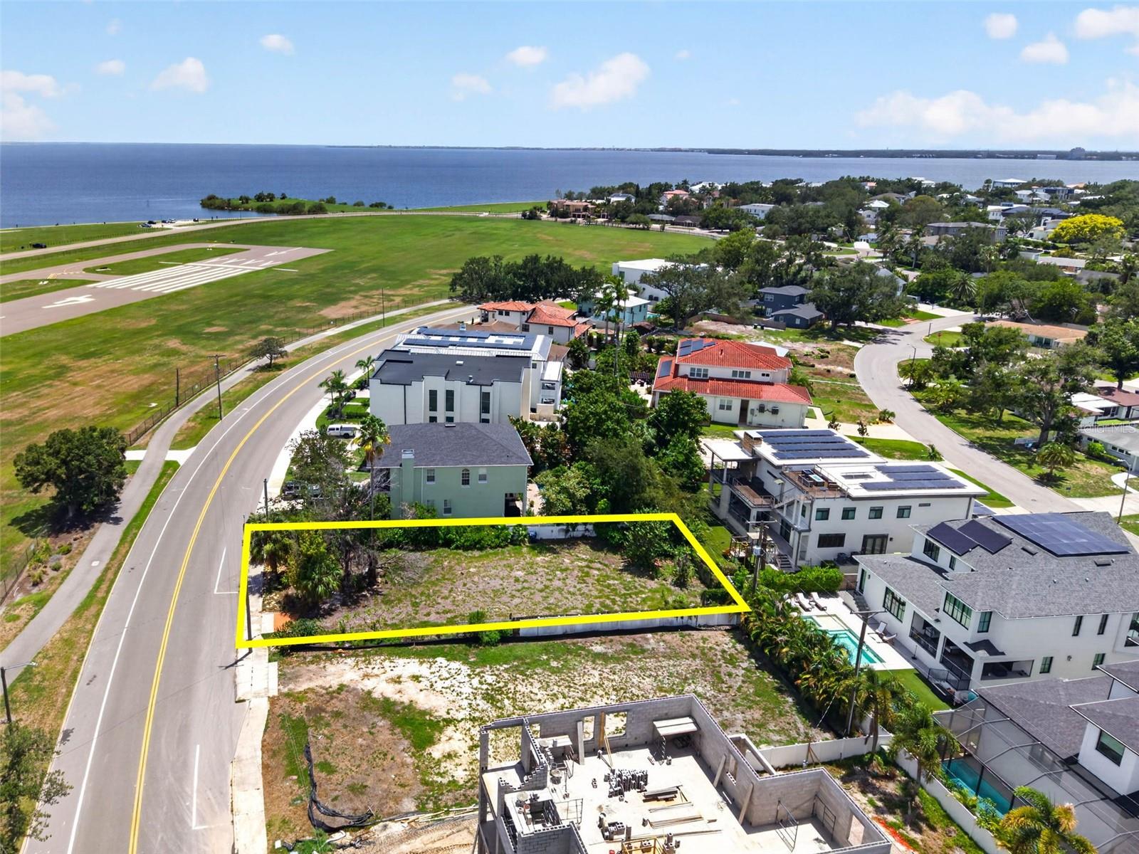 Imagine building your custom dream home on Davis Islands, one of Tampa's most sought-after neighborhoods. If you're tired of compromising on floor plans, finishes, or location, this 60 x 133 lot offers the opportunity to create a home designed entirely around your lifestyle.  Davis Islands has consistently remained one of Tampa's premier luxury real estate markets, making new construction not only an incredible lifestyle choice but also a strong long-term investment.  Experience true island living with the convenience of walking, biking, or cruising by golf cart to charming cafés, local restaurants, boutique shops, parks, public tennis courts, baseball fields, dog park, Davis Islands Beach, the public marina, and Davis Islands Yacht Club. Water lovers will appreciate the quick access to Tampa Bay for boating, paddleboarding, kayaking, and endless waterfront adventures.  A unique feature of Davis Islands is Peter O. Knight Airport, where aviation enthusiasts can enjoy watching private aircraft come and go from the comfort of their own home.  Located just minutes from Downtown Tampa, Water Street, Sparkman Wharf, the Tampa Riverwalk, fabulous dining, shopping, entertainment, and professional sports venues, Davis Islands truly offers a "city within a city." The neighborhood is also zoned for highly rated Gorrie Elementary, Wilson Middle School, and Plant High School, making it one of South Tampa's most desirable places to call home.