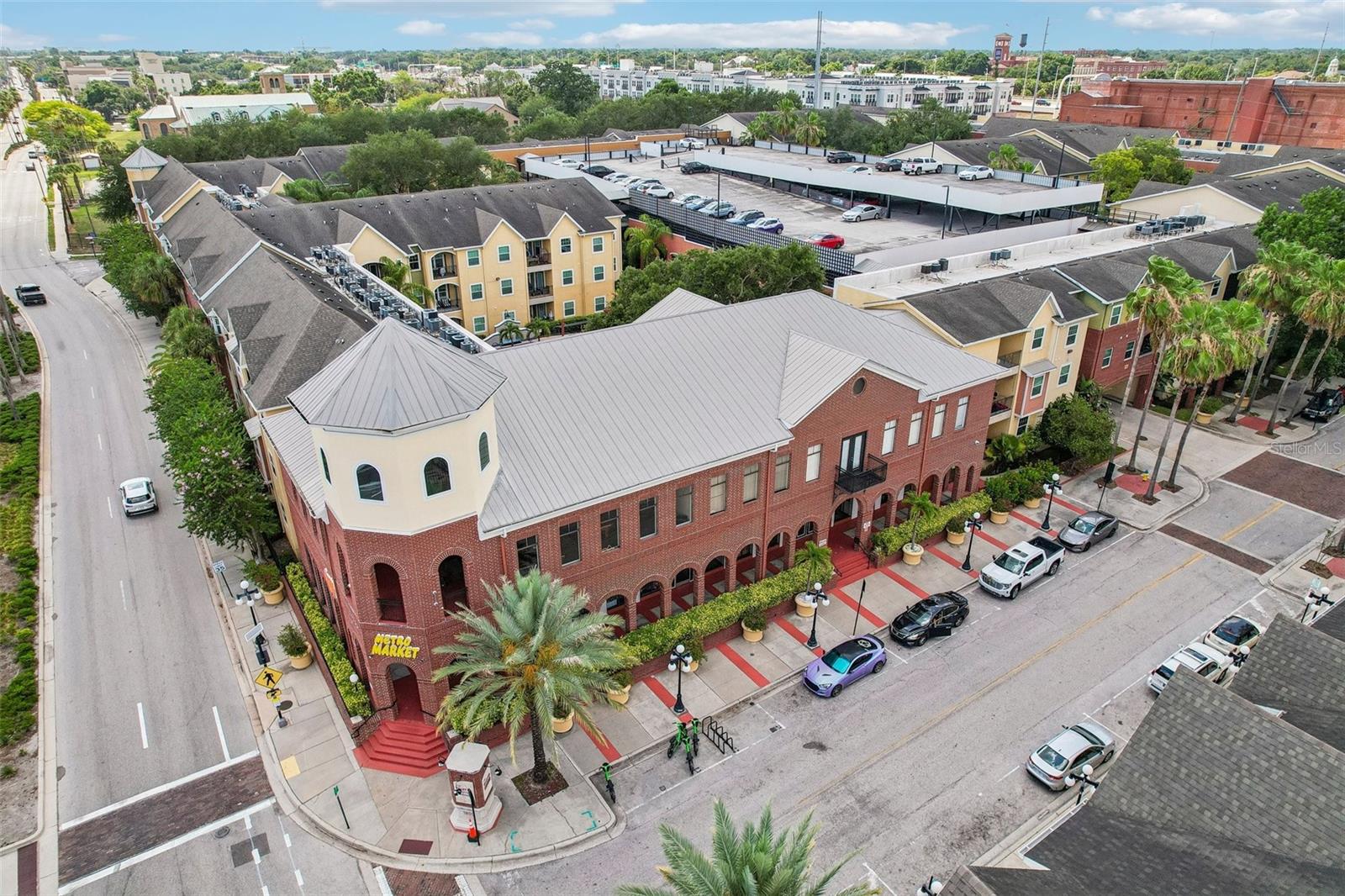 Located just blocks from all the vibrant energy Ybor City has to offer, this 1,146-square-foot, 3rd-floor corner unit condo delivers a quiet community retreat and ultimate urban convenience. Featuring 2 bedrooms and 2 bathrooms, the interior is designed for easy upkeep with linoleum flooring stretching across the living room, dining area, bedrooms, and bathrooms, all complemented by durable solid surface countertops. Comfort is built right in with ceiling fans in the main living space and both bedrooms, while the primary bathroom boasts double sinks, a side linen closet, and a relaxing garden tub/shower combo.  This unit comes complete with 2 assigned garage parking spots.

THE QUARTER AT YBOR is a gated community with an on-site manager and luxury amenities, including two resort-style pools, a fitness center, an outdoor patio, a private stadium-seating theater, and a lively community room complete with a full kitchen, pool table, and foosball. Best of all, you are just a short walk from the neighborhood's hot spots and steps from the first trolley stop, with toll-free access to Publix, the Channel District, Sparkman's Wharf, Amalie Arena, and Downtown Tampa!