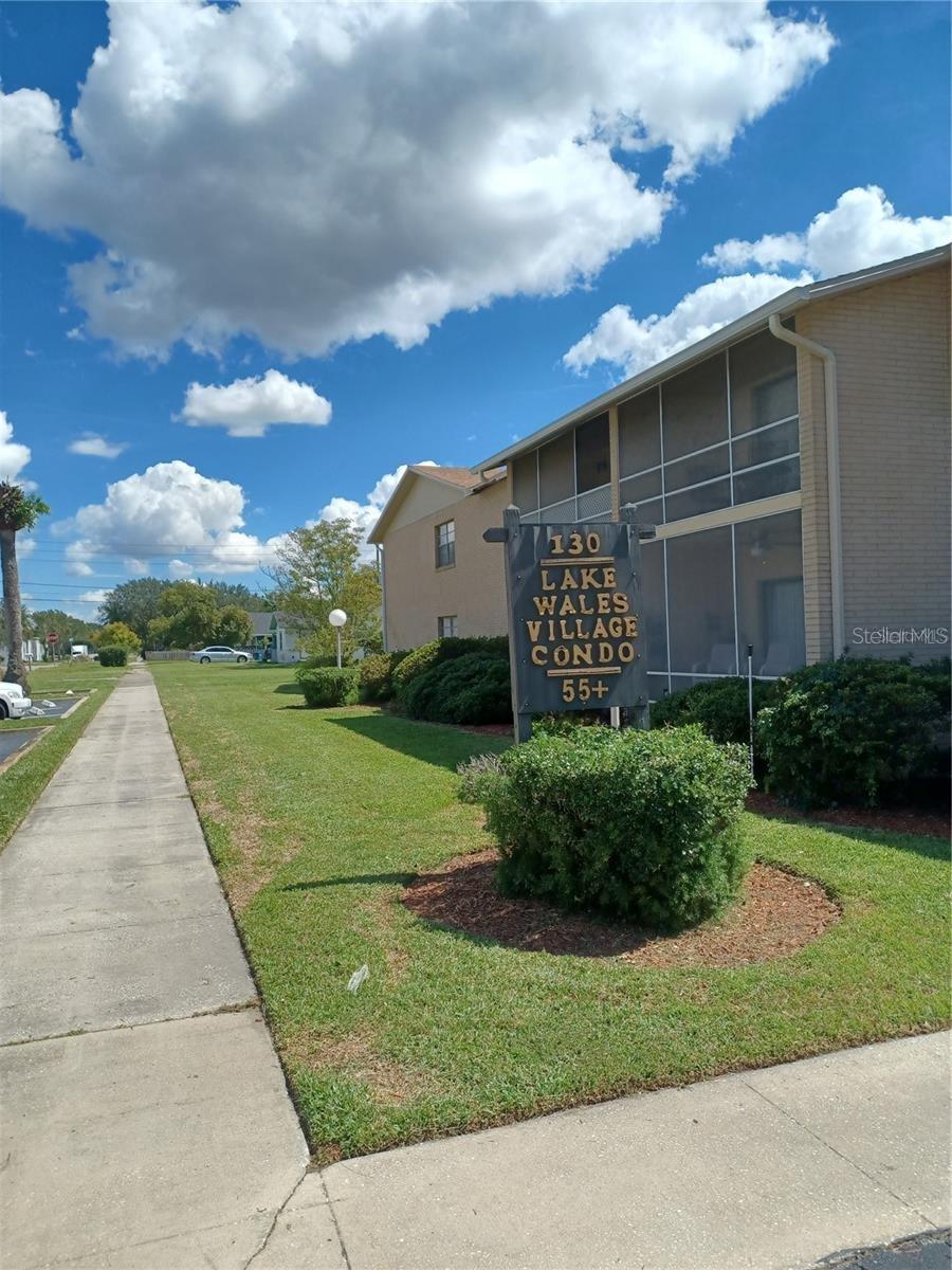 LOCATION!! This cozy FIRST FLOOR condo with parking out front is located downtown Lake Wales. 2 bedrooms, 2 bathrooms, screened patio, hurricane windows and more! This 55+ community features Recreation Facility, Swimming Pool and Laundry Facilities. It is conveniently located near the downtown area of Lake Wales with sidewalks leading to shops, restaurants, banks and churches. Just 3 blocks from the beautiful Lake Wailes Lake walk path with breathtaking nature views. The historic Bok Tower is only 5 minutes away. Great opportunity that's very affordable for full-time or as a winter retreat, and is ready for new owner to enjoy a carefree Florida lifestyle! You won't want to miss this. Listing agent-owner.