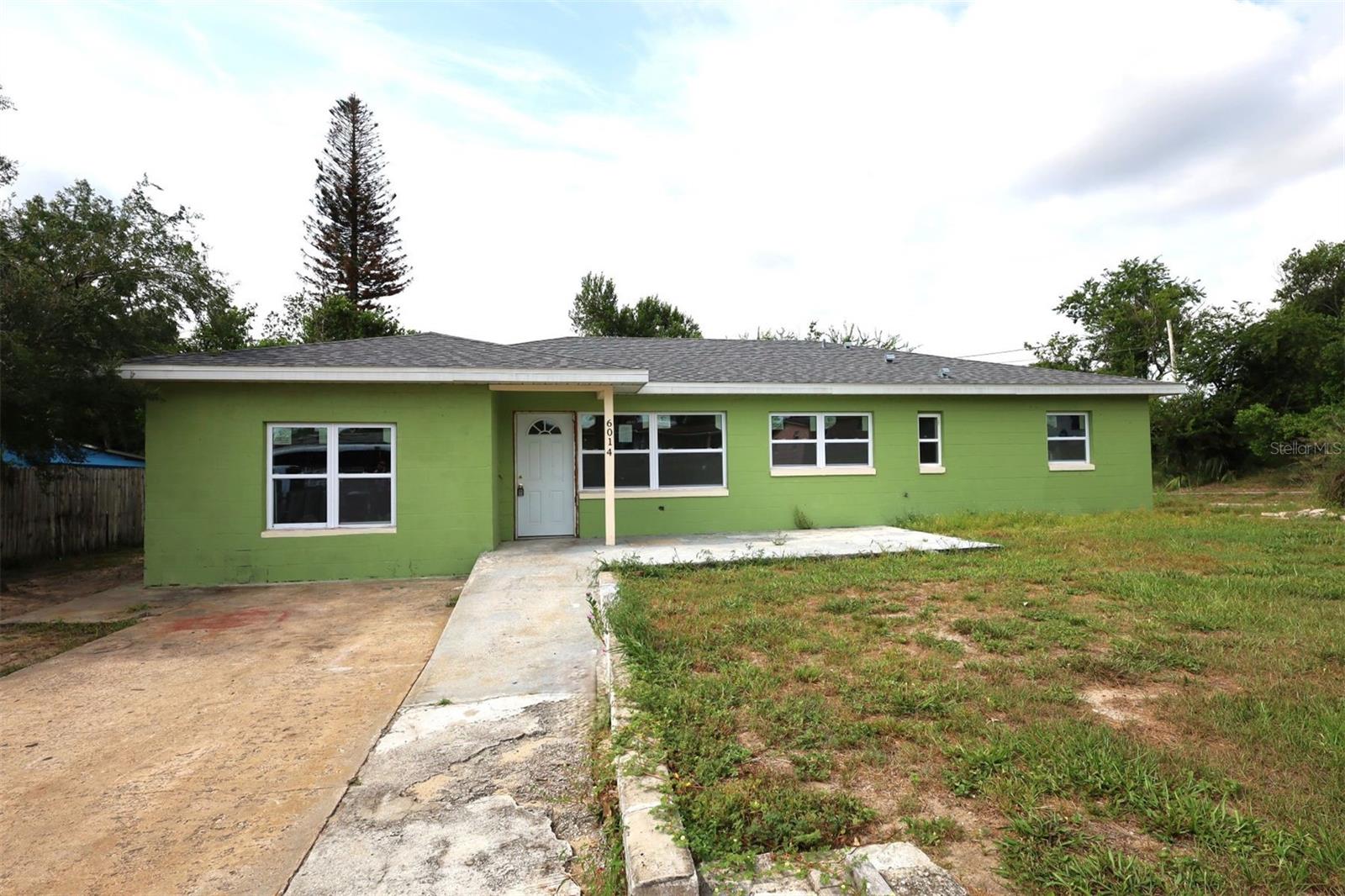 This single-family residence offers 4 bedrooms, 2 bathrooms, and 1,810 square feet of thoughtfully arranged living space. Located on a larger lot, providing additional outdoor space rarely found in this established community. The home recently had updates and a structural expansion, creating a versatile floor plan that caters to modern needs. Currently prepared for final finishing touches, this property offers a unique opportunity for buyers to customize the interior to their specifications. A significant benefit of this property is that there is no HOA, providing more flexibility for owners. The neighborhood is situated within reach of key local roadways, facilitating easy commuting to downtown Orlando and surrounding business districts.
