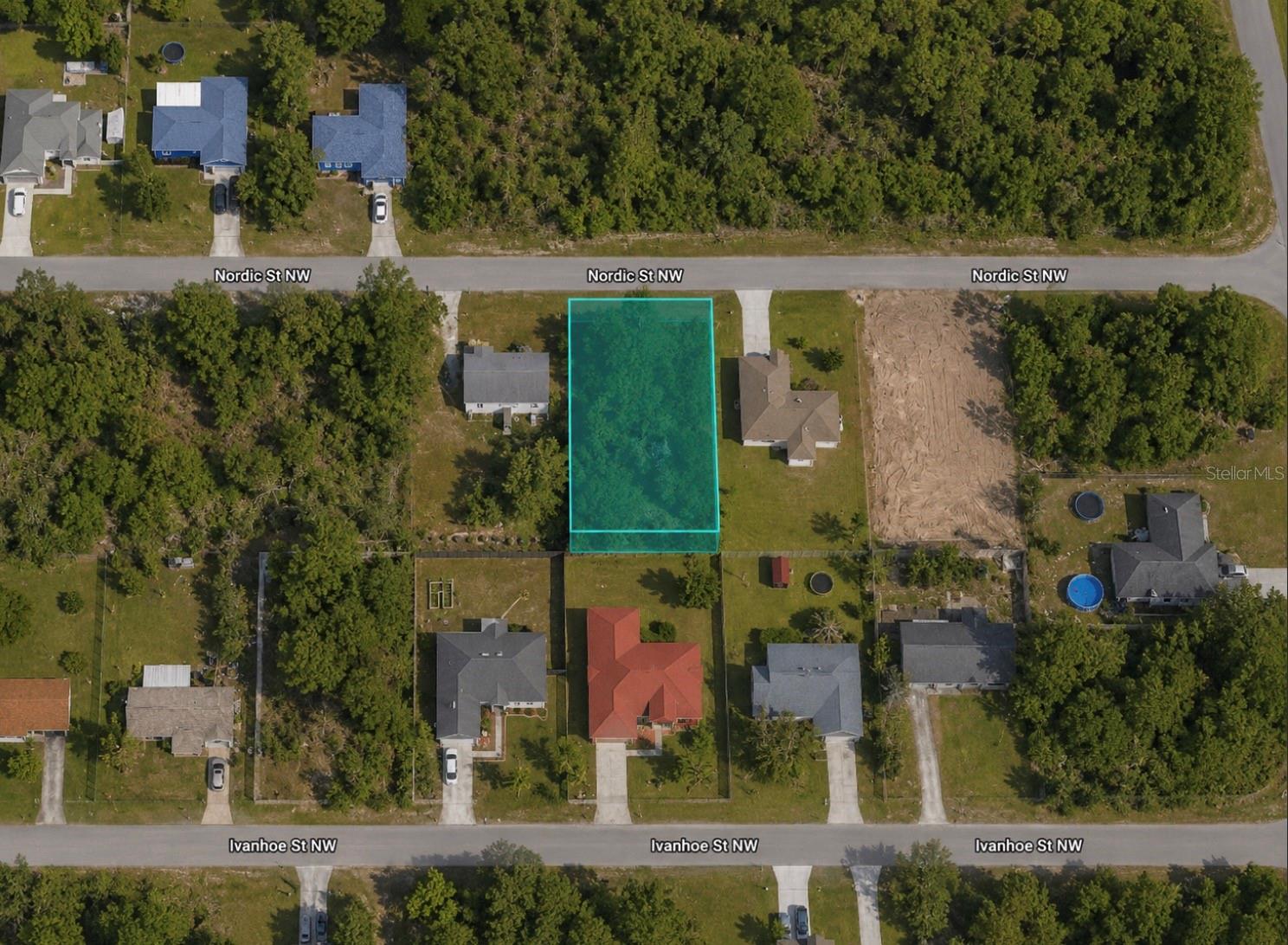 Build your dream home on this residential lot in an established Palm Bay neighborhood. Situated on a paved road with neighboring homes on both sides, this property offers a great opportunity for new construction in a growing area. Enjoy the convenience of nearby shopping, dining, schools, parks, and easy access to major roadways while maintaining the privacy of a quiet residential setting.

Cash purchase only. Buyer to verify zoning, utilities, environmental conditions, and building requirements during due diligence. Buyer pays all closing costs.