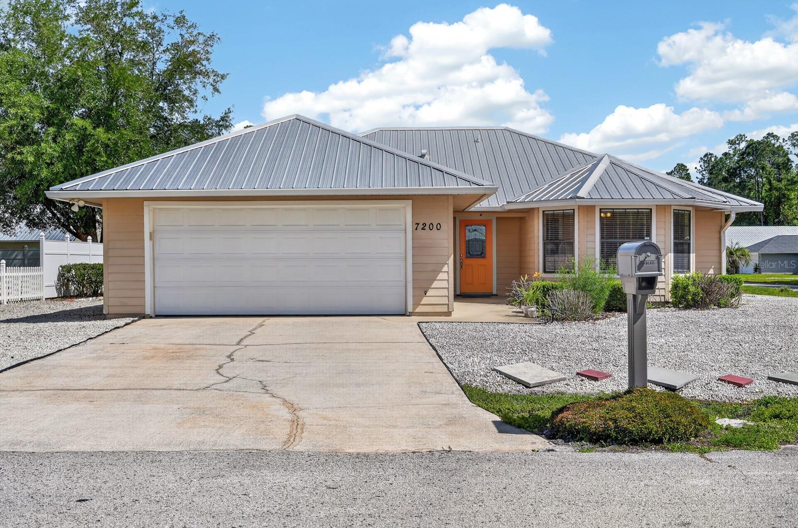 Seller is now offering a $3,000 credit toward the buyer's closing costs and prepaids with a full-price offer!
3 bedroom, 2 bathroom corner lot home in Tierra Woods, Palatka, Florida with no HOA. Built for long-term ownership with a lifetime metal roof (approx. 3 years old), a new HVAC system installed in 2022, and annual termite protection through Crescent City Termite Control. Maytag washer and dryer, Samsung electric range, and a Clack 1054 whole home water softener are all included at closing. Step outside to a large screened in patio, pea gravel and paver patio, brick firepit, and garden trellis surrounded by open yard space. The front garden runs on drip irrigation with a programmable timer. A brand-new Graceland storage shed and an attached 2-car garage provide storage and parking. This home sits on the same electrical grid as the regional hospital for added reliability during storm season. No HOA. No restrictions. Move-in ready.