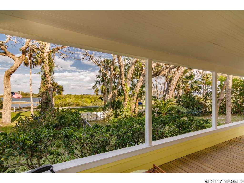 Priced 16k below appraised value!!! Complete renovate in 2014. Sellers are moving out of state!! Stunning is the only word needed to describe this gorgeous, historic, waterfront home that has been completely remodeled on the Intracoastal waterway. Just under an acre of land and 125â river frontage with dock and riparian rights, this home is DEEP WATERFRONT - Sellers have estimate and plans for the future owner to be able to reconstruct the dock into the Intracoastal for DEEP WATER DOCK up to 230' to make it even more of a dream home! As a new owner build your dock to suit! Majestic oak trees fill this property with a beautiful front porch to entertain or simply enjoy your morning coffee watching the dolphins & sailboats go by. Nestled on top of a high lot so you truly get the best riverfront breeze as well as privacy. This 4 bedroom 3.5 bath home with mother-in-law suite is a wonderful piece of New Smyrna Beach history originally built in 1916 and fully restored and upgraded with new EVERYTHING. This home is completely turn key and has been taken down to the studs and been rebuilt to itâs classic charm with modern upgrades. Original heart pine floors, new upgraded kitchen with granite, kitchen island, stainless appliances, wine fridge & farm sink. Surround sound throughout the first floor. New high efficiency windows, siding and metal reinforced framing throughout with hurricane shutters for every window including mother in law suite. Sound proof insulation. All new electrical and plumbing. 2-car garage or workshop. Two newer 2014 AC units with 10 year warranty. Gorgeous master bedroom with incredible river views and en suite with insulated jacuzzi tub and walk in shower. No detail was spared - this dream home is a must see!!!All measurements are approximate, measured by realtor. ;Water: City