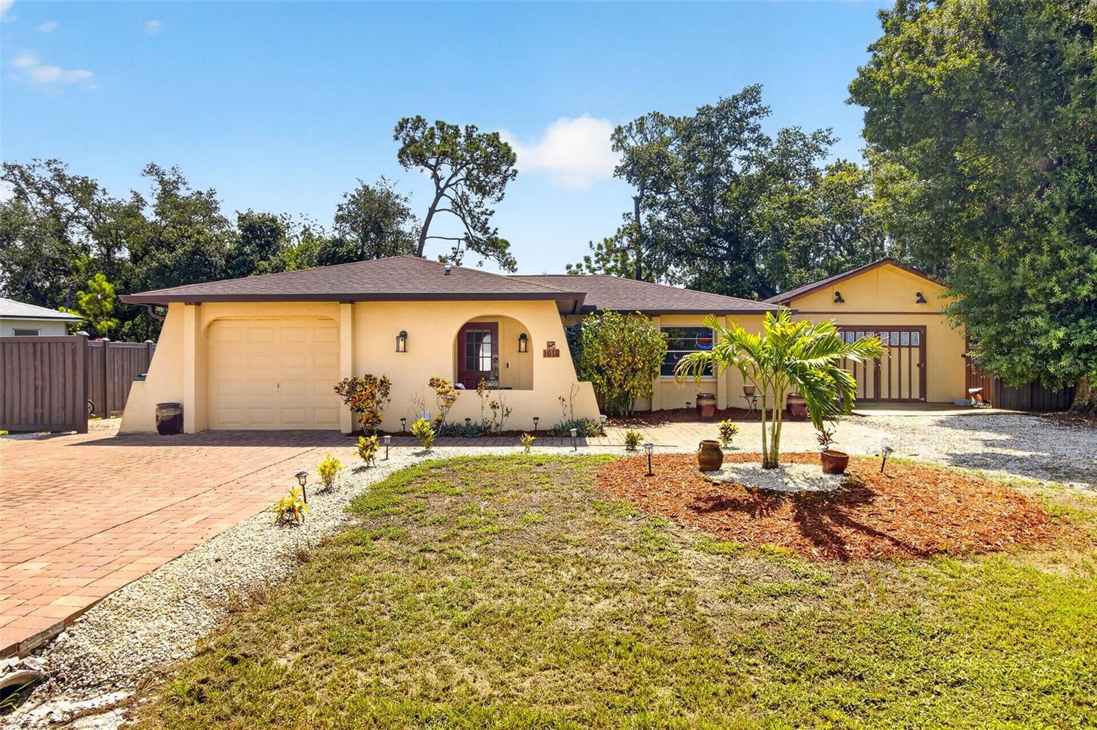 Florida Living at Its Finest; Beautifully Remodeled Home with an Entertainer's Backyard Oasis! Welcome to 1018 Kensington Street, where modern updates, incredible outdoor living, and an unbeatable location come together to create the Florida lifestyle you've been dreaming of!
From the moment you arrive, you'll appreciate the 2023 NEW ROOF, attractive curb appeal, and front and rear paver walkways and patios that set the tone for this move-in-ready home. Step inside to discover a completely remodeled interior featuring stylish finishes, upgraded fixtures, and a bright, open layout designed for comfortable everyday living. The true showstopper awaits outside! The expansive covered and open-air outdoor entertainment area is a one-of-a-kind retreat, complete with a custom outdoor bar featuring water, electric, and cooling misters, making it the perfect place to host game days, backyard barbecues, family gatherings, or simply unwind with friends year-round. This is Florida outdoor living at its absolute best. The oversized backyard offers endless possibilities with plenty of room for a pool, outdoor games, gardening, pets, or additional recreational space. Need extra storage or a workshop? The impressive 16' x 32' drive-in matching shed provides abundant room for vehicles, boats, tools, hobbies, or all your Florida toys. Adding even more versatility, the converted garage creates valuable bonus living space that can easily serve as a family room, home office, fitness room, media room, game room, or guest retreat.
Perfectly situated in the heart of Port Charlotte, you'll enjoy easy access to everything Southwest Florida has to offer. Spend your days exploring nearby Gulf beaches, boating from local marinas, fishing world-class waterways, kayaking, golfing, shopping, dining at popular waterfront restaurants, or enjoying the area's beautiful parks, trails, and year-round outdoor recreation. Conveniently located near US-41, I-75, medical facilities, entertainment, and everyday conveniences, this location truly puts everything within reach.
Homes offering this combination of extensive upgrades, exceptional outdoor entertaining, bonus living space, oversized storage, and an unbeatable location are hard to find. Schedule your private showing today and experience why this property stands out from the rest!
Minutes to beaches, marinas, parks, golf, shopping, restaurants, and more; schedule your showing today! 
Exclusions: Dining room and kitchen glass light fixtures will be replaced prior to closing. Decorative gas pump on the patio does not convey.