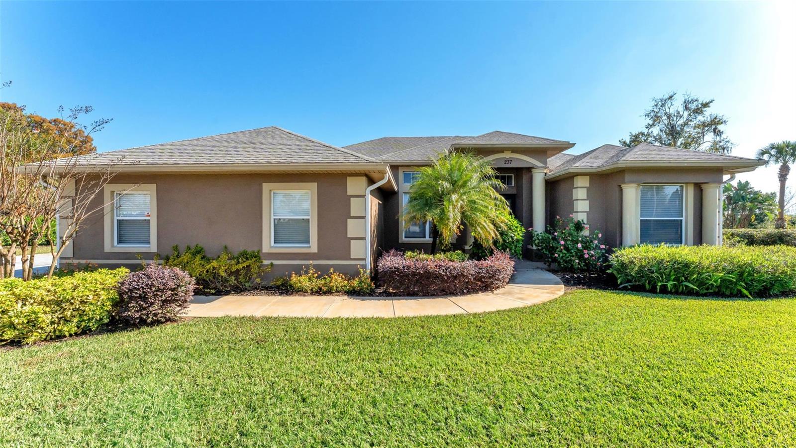 Are you looking for a completely remodeled lakefront home on 5 acres? Then look no further! The home has a screened in back patio, a separate air-conditioned 2 car garage/workshop as well as an attached 2 1/2 car garage with the 1/2 being a golf cart garage, a separate boathouse with lift and much more! The home has beautiful lake views, direct lake access and is a venerable fisherman's paradise! This remarkable home was recently remodeled featuring new plumbing and electrical, Maytag washer and dryer purchased in 2025. In the bathrooms there are new upgraded fixtures, a tankless water heater in the master bath, stone flooring and stone tile in the showers, glass around the showers, champagne gold deluxe new shower heads, new mirrors with custom frames and a stand-alone tub. In the dinette/breakfast nook there is a custom dry bar with 2 kitchen aid wine refrigerators and new custom cabinets in laundry room. All of the bedrooms feature new paint and, custom closets made by CLOSETS BY DESIGN and deluxe recess lighting in all rooms. The kitchen has all KITCHEN AID appliances; quartz countertops, a motion activated sensor Faucette, a wolf steam oven and the cabinets are made of maple and creamy glaze maple all made by A. WARD cabinets with under counter lighting and receptacles! Where there isn't tile, the home has all new luxury vinyl plank flooring, new paint and lighting fixtures throughout as well as custom remote-controlled blinds throughout the house. Outside the home has new landscaping and the boathouse has been rewired. Don't miss out on this unique opportunity in central Florida!