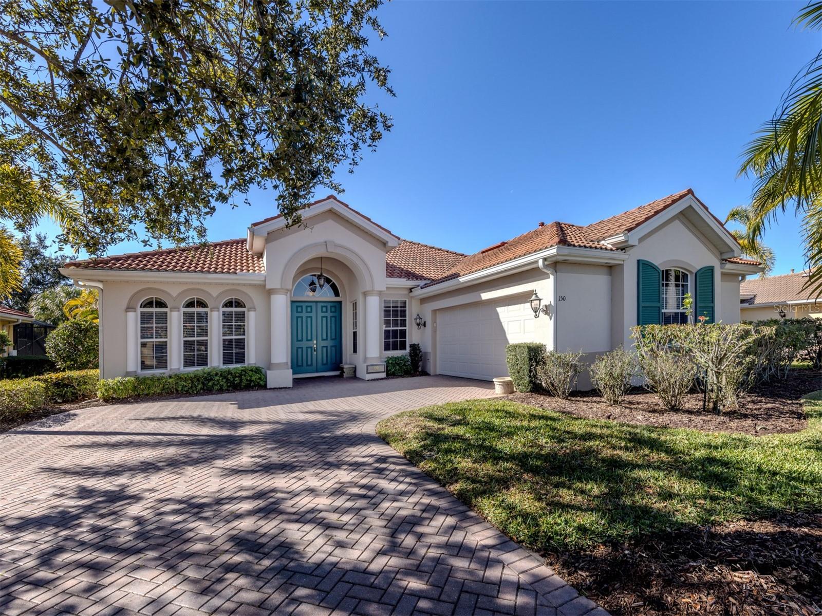 Price Adjustment...Welcome to your new home in the desirable Venetian Golf & River Club, famous for being known as a resort-style community with golf, tennis, pickleball, two swimming pools, two dining clubs, exercise classes and gym, with a lovely walking trail where one can enjoy beautiful flora and fauna. This lovely spacious home boasts 2,400 square feet of casual luxury living. This home consists of large bedrooms, 12-foot ceiling in the welcoming and relaxing great room that combines with a gas-fired kitchen for the gourmet cooks, an office/den/flex room, two and a half baths and three walk-in closets. Private backyard that's big enough for a pool. The landscaping was redone in 2019 and Ponytail palms planted more recently. Double wood doors greet you as you enter this beautiful home and it's clean! As you enter the foyer, look to your left and find a 12-by-13-foot formal dining, to the right is the den/flex room with two French doors for privacy. The primary bed ensuite offers two large walk-in closets and has double doors that lead to the tiled lanai with its small kitchenette (beverage cooler works great but is not warranted). A split floor plan gives maximum privacy to you and your guests. The community has two restaurants, golf, tennis, pickleball and boardwalk to view beautiful greenery and wildlife. And 42-inch upper cabinets recently installed in laundry. You will find the custom pull drawers in the kitchen's lower cabinets a benefit for your back. New to newer: washer...dishwasher...gas water heater...top of line 3 zone air-conditioning...kinetico whole house water system...make an appointment and SEE FOR YOURSELF!!!!