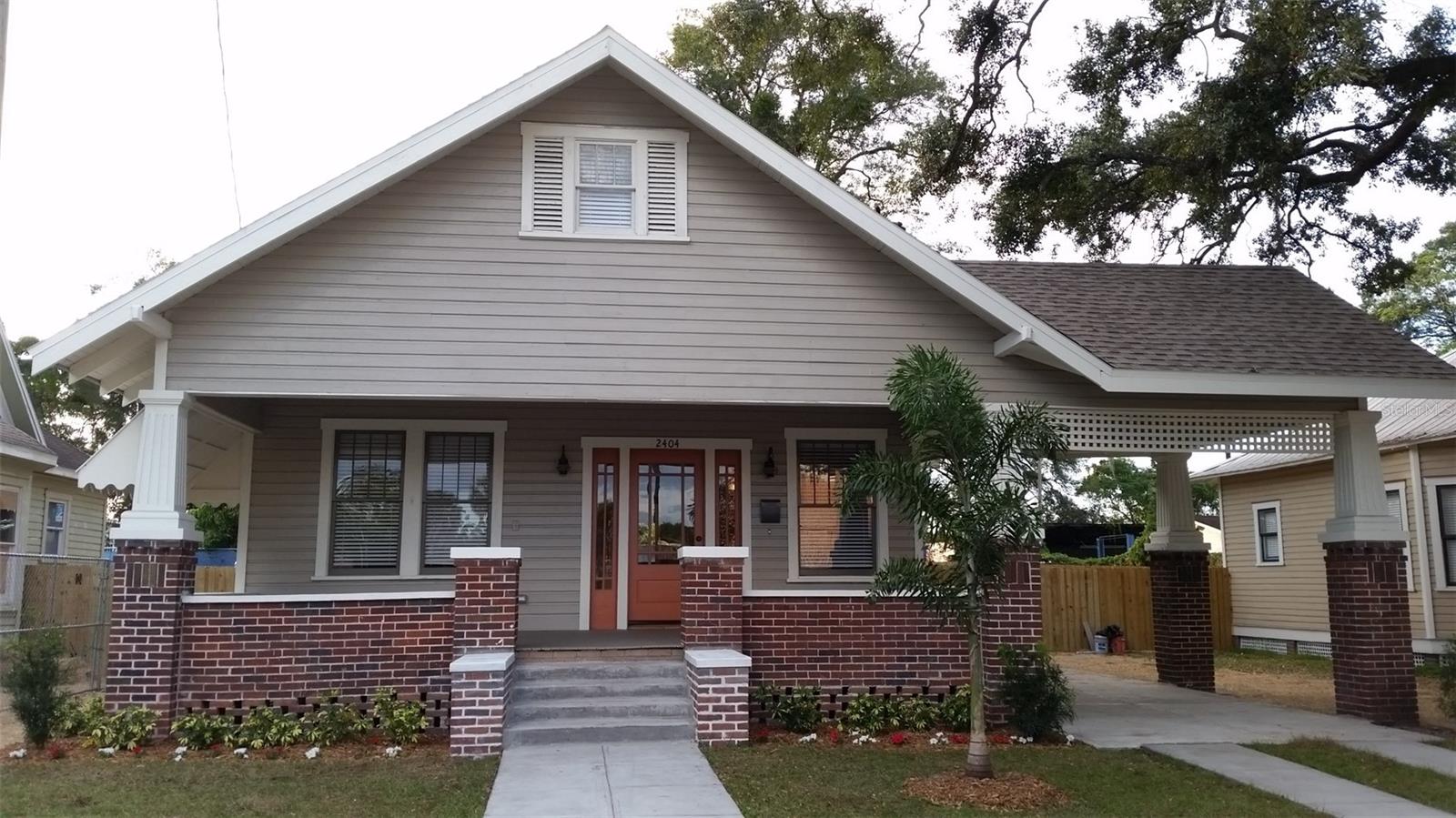 Amazing 3BR, 2BA Bungalow in historic Tampa Heights. Home has been FULLY RESTORED with lovely front porch and open floor plan – perfect for family gatherings or entertaining friends with all the convenience and amenities of newly built homes. Enjoy spacious nine-foot ceilings and antique 5-panel doors with natural light from oversize windows shining on the beautifully restored oak flooring and brick faux fireplace. The large kitchen, complete with granite counters and stainless-steel appliances, is accented with historic pendant lighting and boasts an original Butler’s Pantry for storage. Both first and second floor BRs have large bathrooms with pedestal sinks and historic style medicine cabinets. Laundry is easy with convenient front-loaded washer-dryer combo in the bonus room which can also be used as a perfect office or den! Plus, the backyard is fully fenced for your privacy. Located in one of the most walkable neighborhoods – the historic Tampa Heights District, this PET FRIENDLY home is only minutes from Downtown Tampa, Seminole Heights, Ybor City and Armature Works Park and Riverwalk. Call for your Showing today! LAWN MAINTENANCE IS INCLUDED!!