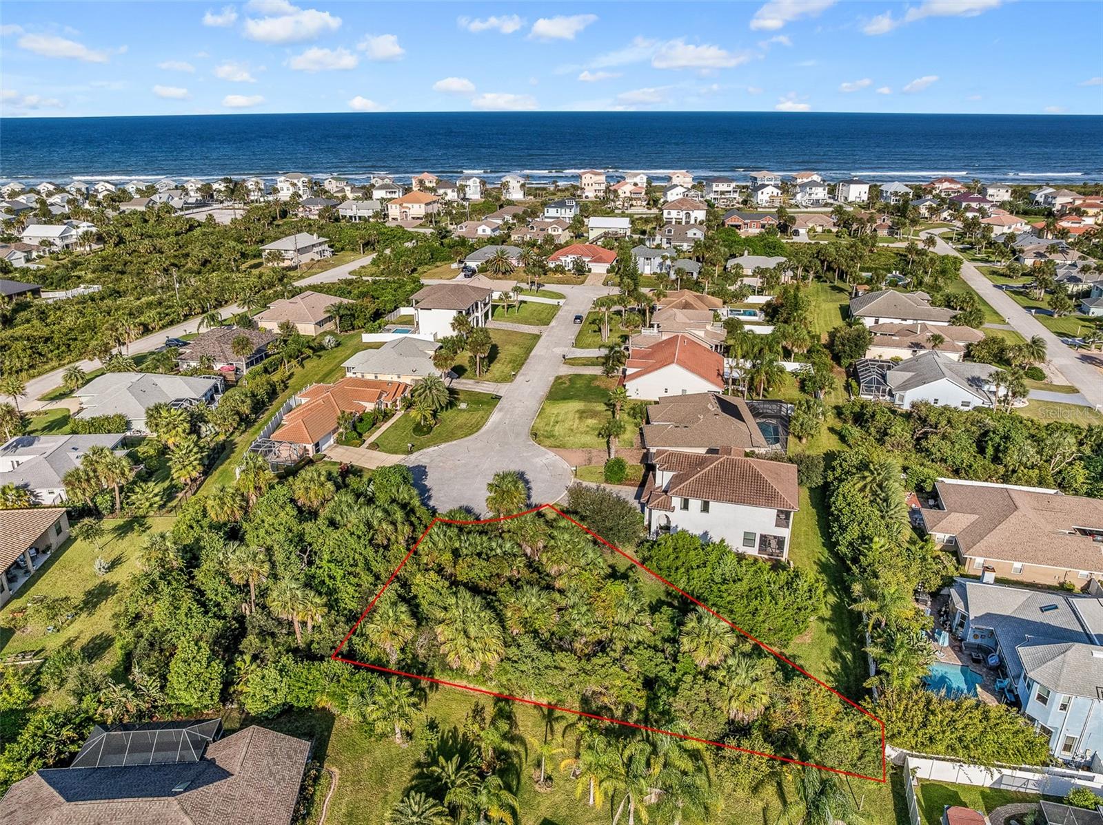 Coastal living doesn’t get better than this. Welcome to 12 Laurel Drive, an exceptional opportunity to own one of the few remaining buildable homesites in the highly desirable East Armand Beach community in Palm Coast. Tucked away on a quiet cul-de-sac east of A1A, this prime lot places you just moments from the sand with PRIVATE BEACH ACCESS and a community pool exclusively for residents.

Whether you’re dreaming of a luxury beach retreat, full-time coastal residence, or investment property, this location delivers the Florida lifestyle buyers are searching for, at an incredible value. Imagine morning walks along the Atlantic, afternoons by the pool, and evenings listening to the ocean breeze from your future backyard.

This homesite is open builder with no minimum build time, giving you the flexibility to design and build at your own pace with the builder of your choice.

Surrounded by natural beauty, you’re minutes from local favorites including Bing's Landing, Washington Oaks Gardens State Park, scenic walking and biking trails, waterfront dining, and everyday conveniences. Enjoy easy access to beloved spots like Captain's BBQ and JT's Seafood Shack while still feeling tucked away in your own private coastal escape.

Included with the property are a boundary survey, topographic survey, and conceptual home plans, giving you a valuable head start toward building your dream home. Opportunities like this in such a sought-after beachside community are becoming increasingly rare. Secure your slice of paradise before it’s gone!