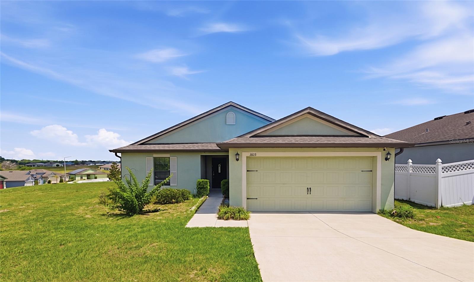 One or more photo(s) has been virtually staged. "SOLAR PANELS FULLY PAID OFF" 1603 Ellington Drive in Dundee, Florida, a three-bedroom, two-bathroom home built in 2017 and situated on a 6,316-square-foot lot in the established Ridge of Dundee community. This 1,563-square-foot residence represents the type of well-built single-family home that appeals to owner-occupants and investors seeking substantial square footage with strong equity positioning and minimal systems risk. The property has been owner-occupied since construction and reflects the care of homeowners who have maintained systems proactively and invested in meaningful upgrades. The defining mechanical upgrade is the brand-new Carrier central air system with integrated heat pump technology, installed within the past year—a feature that immediately differentiates this home from competing inventory featuring older or failing AC systems. Unlike traditional split systems or heating strips located in attics, the heat pump automatically manages temperature transitions as weather changes, providing both efficiency and convenience. The system is modern, efficient, and capable of managing heating and cooling demands for years to come. The roof is original to the 2017 construction; while the shingles are now ten years into their lifespan, a recent professional evaluation by a roofing specialist confirmed the system remains sound and does not yet require replacement. When minor water intrusion occurred in the master bathroom and garage wall—a known vulnerability on properties positioned on the ridge elevation where wind-driven rain can blow under shingles during storms—the affected areas were sealed and have remained dry through subsequent weather events. The slab foundation is stable, and the home's plumbing and electrical systems function properly. The two-car garage provides parking and storage space. The lot represents a genuine advantage: at 6,316 square feet, it is substantially larger than typical neighboring properties and offers private outdoor space. This size became available because the original neighborhood design incorporated common areas and varied lot dimensions across the development phases. The property sits in Ridge of Dundee, a 500-home community that has appreciated measurably as newer phases were completed. The neighborhood benefits from restrictive covenants that maintain property standards without prohibiting investment or rental use, giving buyers flexibility in ownership strategy. HOA fees of $400 annually cover community maintenance, and the neighborhood includes public water and sewer service, eliminating private well or septic concerns. Location advantages include access to retail shopping, dining, and medical facilities within Dundee and the surrounding area. Highway 17 provides direct regional connectivity. For owner-occupants seeking a recently built home with a new AC system, strong lot size, and equity positioning in an appreciating neighborhood, this property offers move-in ready opportunity with potential for selective cosmetic updates. For investors, the assumable mortgage at a competitive 4.5 rate, the strong lot size, the recently upgraded mechanical systems, and the HOA community standards create an attractive acquisition profile. The home is priced appropriately for the neighborhood and the current market, reflecting both the recent systems upgrade and the long-term appreciation fundamentals of the Ridge of Dundee area.