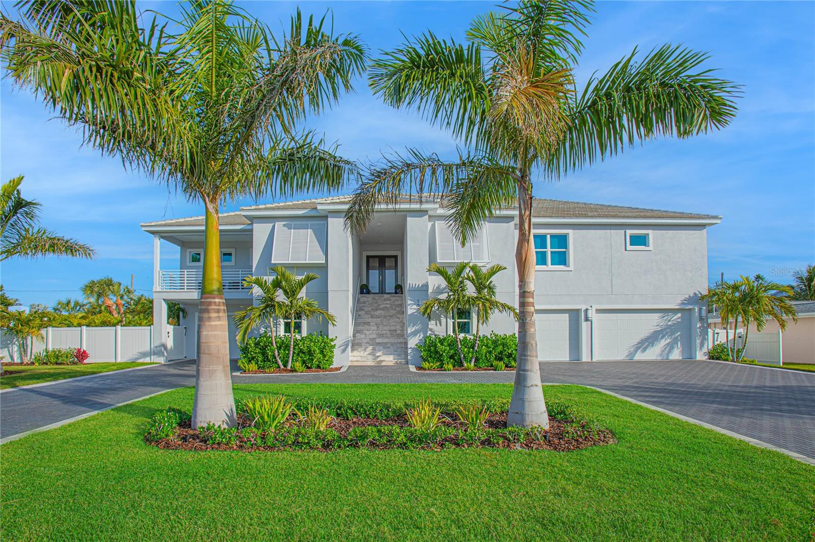 PRIVATE RESIDENTIAL ACCESS TO THE GULF OF MEXICO PLUS NEW POOL! Presenting an unparalleled residence, this four-bedroom, four-bathroom marvel stands proudly on an expansive 140 ft-wide double lot. Situated just a stone's throw away (a mere 30-second walk) from the velvety sands of Belleair Beach, this home provides exclusive residential access to the Gulf of Mexico. Crafted by the esteemed developer of Belleair Beach, built in 2022 and one of the newest homes built in the area, the home boasts four bedrooms, four bathrooms, formal dining and an office, adorned with luxurious finishes, premium materials, and exceptional craftsmanship.Elegance reigns as you step into the 4,464 sq.ft. of living space, designed with a meticulous eye for detail. High contoured ceilings create an airy atmosphere, enhancing the overall living experience. The great room, accompanied by a state-of-the-art Miele and Gaggenau gourmet kitchen, forms the heart of this residence. Entertainers dream , open the sliding doors that access the covered balcony and bring the outside in. There is a formal dining room and a breakfast room plus seating at the expansive center island in the kitchen providing so many options for your dining. Split bedrooms all with walk-in closets and are generously proportioned, and every bathroom is opulently appointed with quartz and marble counters, paired with top-notch Kohler and Kallista fixtures. European Oak hardwood floors grace the interior and shine through every room. The office can easily transition into a media room or playroom. The laundry has cabinets, sink and storage closet. The home exudes sophistication with wood closet systems, crown moldings, solid core doors, upgraded lighting and wood cabinetry throughout. A remarkable 14-car garage, more akin to a supercar showroom, caters to the needs of automobile enthusiasts. The lower level also features an elevator for easy access to the living space above. Enjoy the seamless transition between indoor and outdoor living with multiple exterior decks, perfect for entertaining or just relaxing and unwinding after a day at the beach. This spot truly enhances the quality of living by providing exclusive access to the immaculate white sand beaches. Picture beginning your day with a peaceful walk along the sandy, white beach and then get home for a cool dip in your beautiful pool. Moreover, its close proximity to international airports brings an added level of convenience for those who travel frequently, making this Belleair Beach gem strategically positioned for both local and international accessibility. Embrace your slice of paradise on Belleair Beach – a perfect fusion of luxury, resort-style living, and the best that Florida has to offer! See Attached list of upgrades and features. Make your appointment today. One year basic home warranty provided. Bedroom Closet Type: Walk-in Closet (Primary Bedroom).