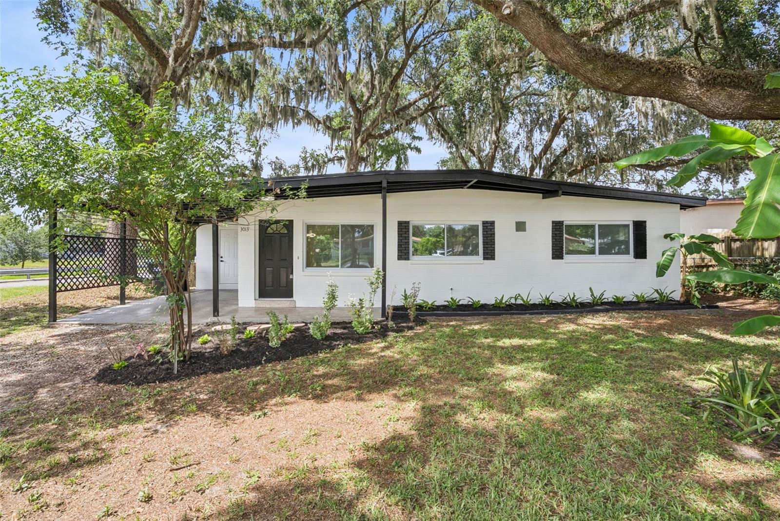 Virtually Staged. Renovated Corner Lot Beauty with No HOA! 

Welcome to **3013 Kelvington Drive**, a beautifully renovated home perfectly positioned on a spacious corner lot in the heart of Orlando. From the moment you arrive, you'll appreciate the expansive yard, large backyard patio, and the freedom of **NO HOA**, offering endless possibilities for entertaining, gardening, or simply enjoying your outdoor space.

Step inside and be greeted by a bright and inviting living room featuring modern recessed lighting throughout, stylish new light fixtures, and energy-efficient remote-controlled ceiling fans that create a comfortable and contemporary atmosphere. The home showcases luxury vinyl plank flooring throughout, providing both durability and elegance.

The stunning kitchen is designed to impress with brand-new stainless steel appliances, gorgeous quartz countertops, and ample cabinetry, offering abundant storage and workspace for everyday living and entertaining. Quartz countertops continue throughout the home, adding a cohesive and upscale touch.

As you make your way down the hallway, you'll find a versatile sitting area or flex space, perfect for a reading nook, home office setup, study station, or additional lounge area. Each bedroom is equipped with energy-efficient ceiling fans and updated lighting, creating comfortable retreats for family and guests alike.

The fully renovated bathroom features a beautiful modern vanity with matte black finishes, a stylish barn door accent, and contemporary design elements that bring both character and sophistication to the space.

Additional upgrades include a brand-new AC system, dedicated indoor laundry room, and convenient access to the covered carport.

Prime Orlando Location

Located just minutes from major roadways, this home offers excellent access to everything Central Florida has to offer:

 Approximately 10-15 minutes to I-4, 15 minutes to Downtown Orlando, 20 minutes to Winter Park, Easy access to shopping, dining, entertainment, and major employers. Close to parks, recreation, and everyday conveniences. Nearby Schools; Riverside Elementary School, Lockhart Middle School & Wekiva High School.

Nearby Attractions & Things To Do

* Lake Lotus Park – Nature trails, fishing, and scenic boardwalks.
* Cranes Roost Park – Outdoor concerts, walking trails, and waterfront dining.
* RDV Sportsplex – Fitness center, ice skating, swimming, and sports programs.
* Wekiwa Springs State Park – Kayaking, hiking, wildlife viewing, and crystal-clear springs.
* Altamonte Mall – Shopping, dining, and entertainment.

Whether you're a first-time homebuyer, downsizing, or looking for a move-in-ready investment opportunity, this thoughtfully renovated home combines modern finishes, functional living spaces, a desirable corner lot, and an unbeatable location—all without the restrictions of an HOA. Schedule your private showing today!