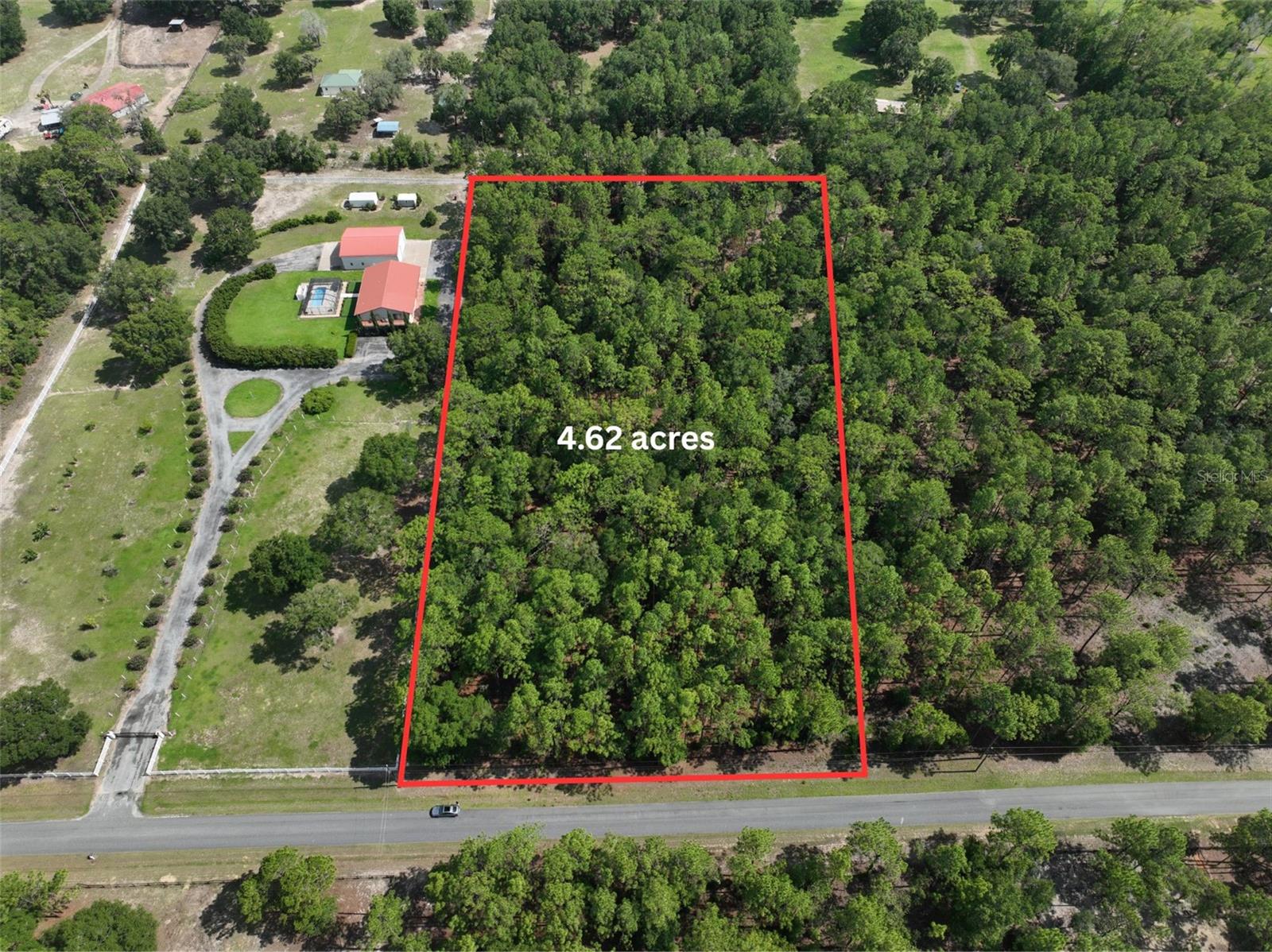 Rare 4.62-acre oversized lot in the highly desirable ROLLING HILLS of Ocala featuring PAVED ROAD frontage, great elevation, electricity available, no flood zone, no wetlands, and the perfect opportunity to build your dream home in one of the area's most sought-after locations; just minutes from shopping, dining, medical facilities, the World Equestrian Center, and all that Ocala has to offer. Listing agent is the owner.