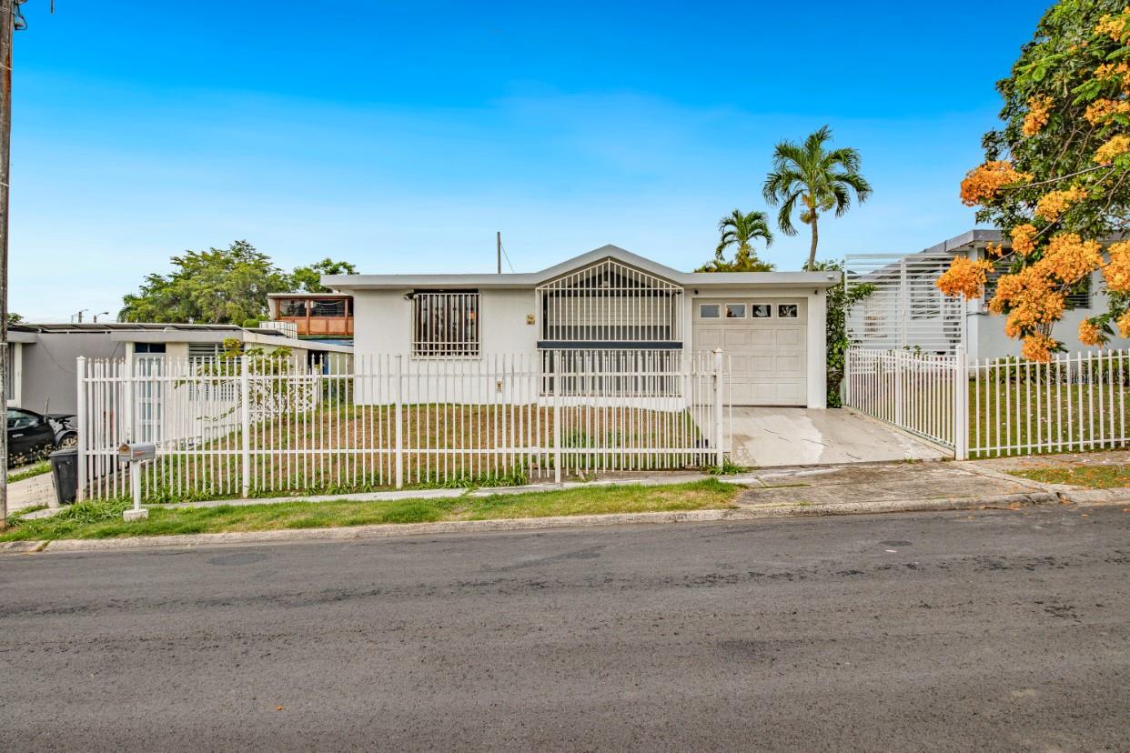 Single-family residence for sale in Urb. Cupey Gardens composed of 3 bedrooms, 2 Full Bathrooms, and 1 Half Bathroom. This home has a garage with space for 2 vehicles; the master bedroom includes a walk-in-closet and an on suite bathroom and covered terrace area in patio. The Kitchen and Bathroom #2 are renovated, and the laundry area is located in the garage. The property has a lot of 364 sqm and the house has an approximate living area of 1,406 sqft. Property Tax (annual) = 1,376. Pre-approval letter or proof of funds required for showings.