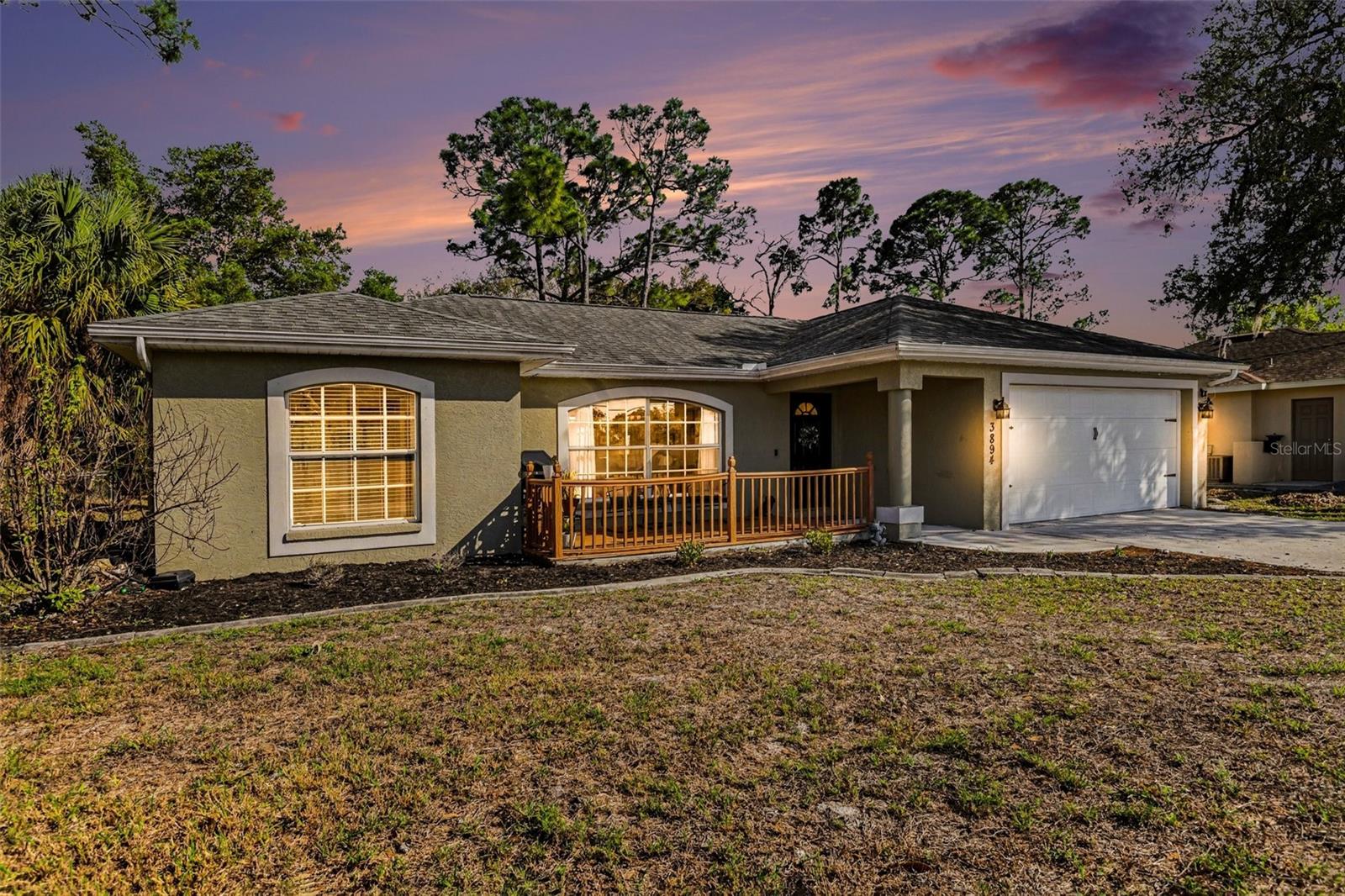 Welcome to this beautifully updated 3-bedroom, 2-bathroom ranch-style home offering the perfect blend of comfort, functionality, and Florida living. Nestled in a desirable area of North Port, this home is move-in ready and designed for both everyday living and entertaining. Step inside to discover a bright and inviting layout with thoughtful updates throughout. The spacious living areas flow seamlessly, creating a warm and welcoming atmosphere for family and guests alike. The kitchen and main living spaces are ideal for gatherings, while the well-sized bedrooms provide comfort and privacy. A standout feature of this home is the versatile bonus room—perfect for a home office. Enjoy the Florida lifestyle outdoors in your fully fenced backyard, offering privacy and plenty of space for pets, play, or entertaining. Gather around the built-in fire pit on cool evenings and create lasting memories! Roof is only 6 years old! Schedule a tour today!
